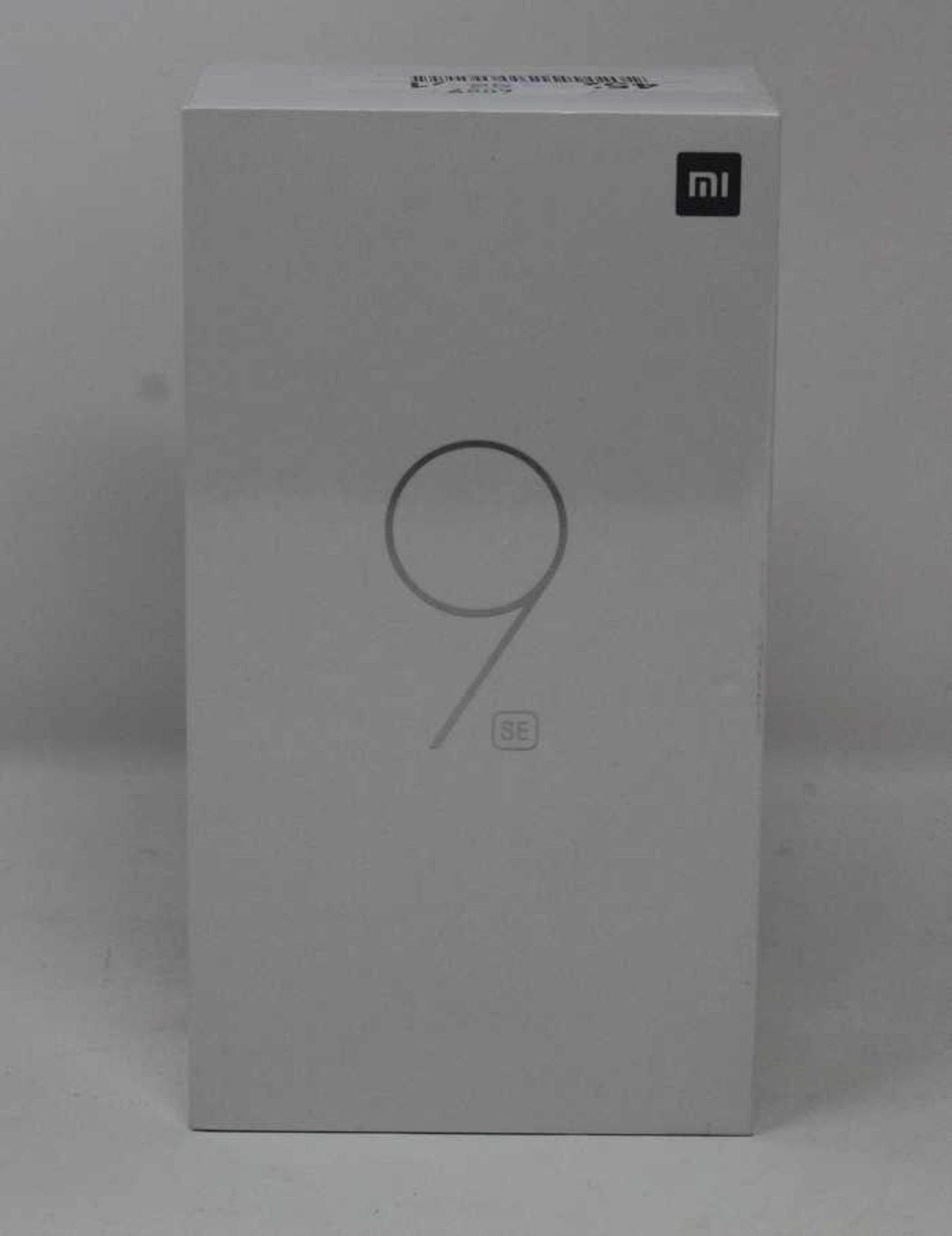 A boxed as new Xiaomi Mi 9 SE Global Version 6GB RAM 64GB Storage Android Smartphone in Piano Black
