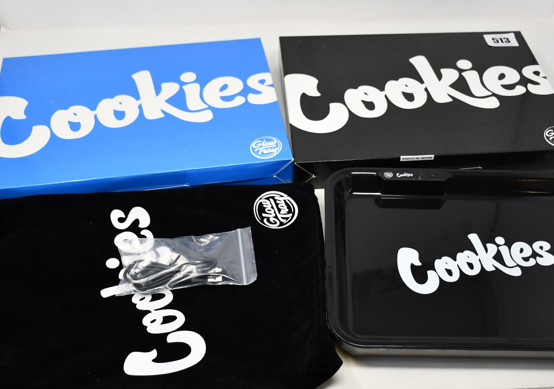 Twenty boxed as new Cookies Glow Tray - light up cigarette rolling tray.