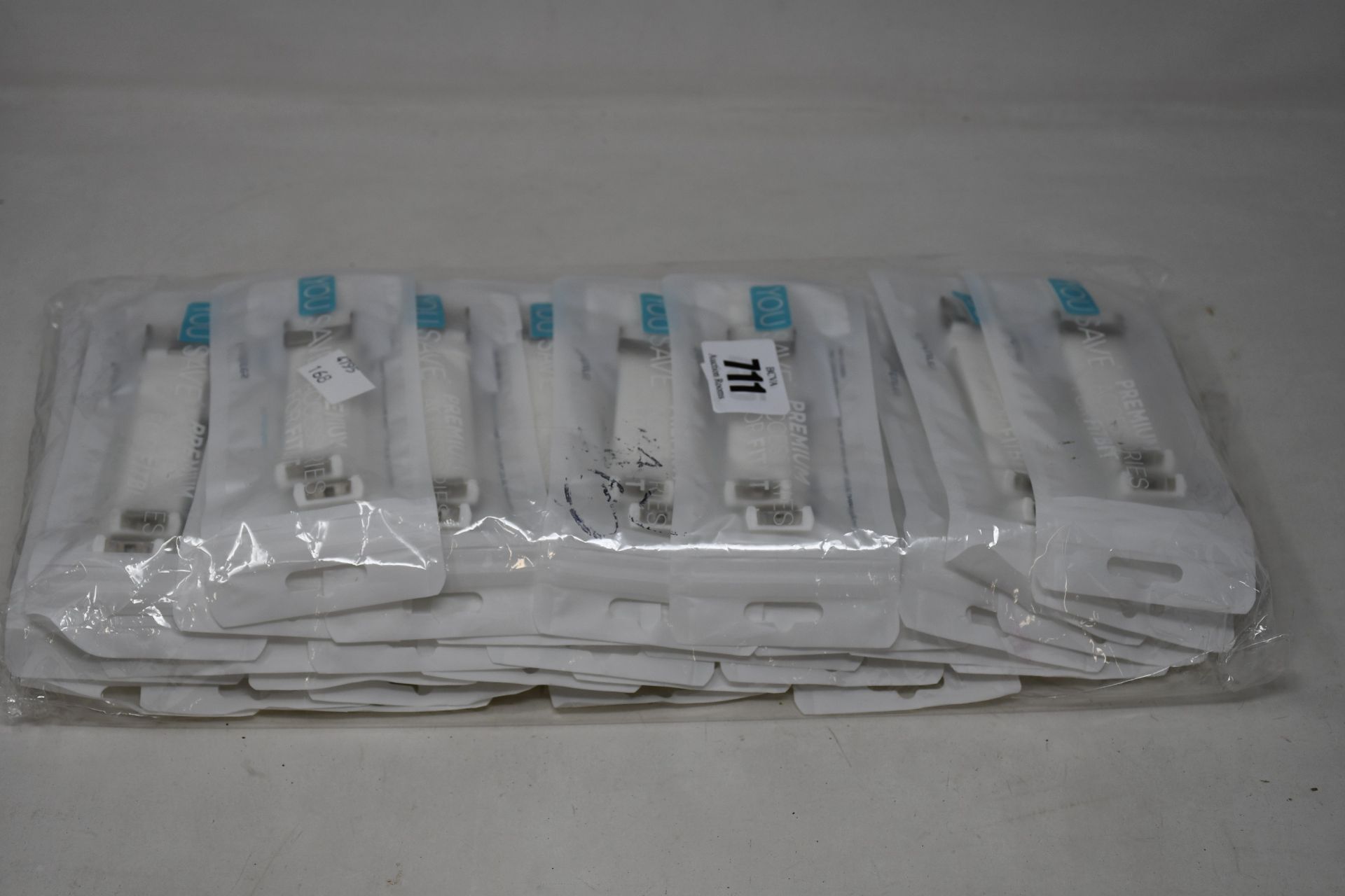 A large quantity of boxed as new Fitbit classic buckle silicone wrist straps in white (Approximately