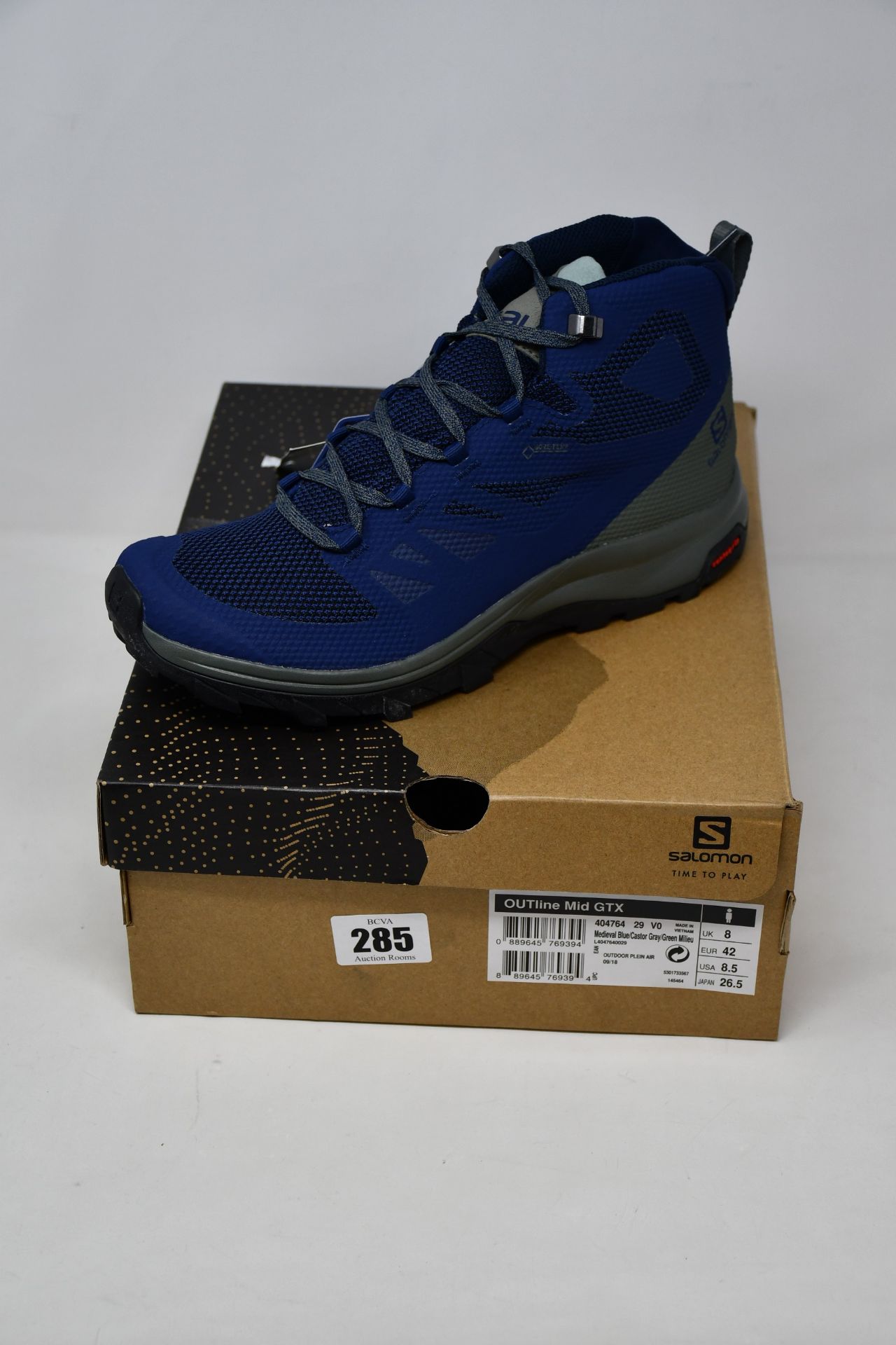 A pair of as new Salomon OUTline Mid GTX walking boots (UK 8).