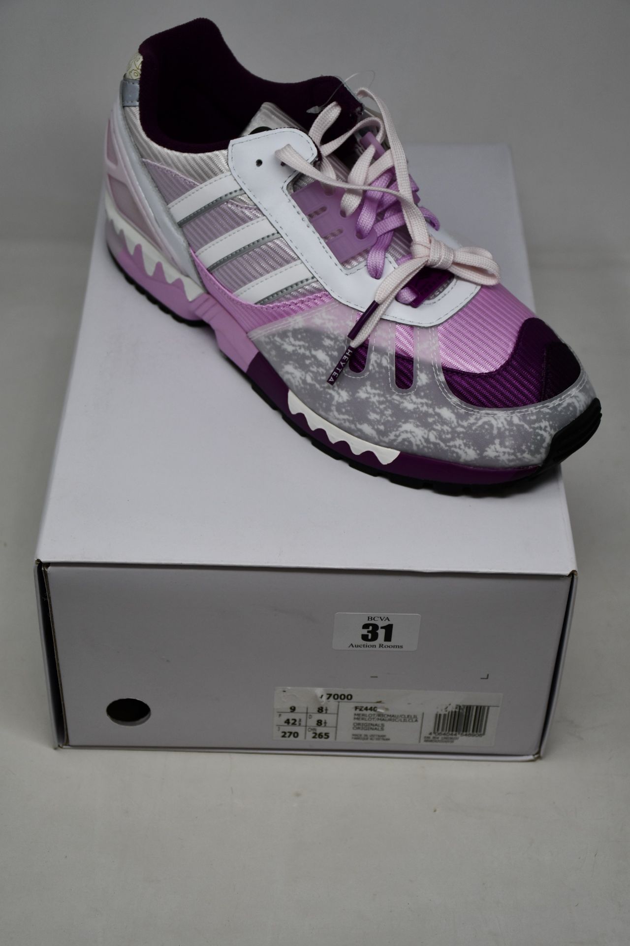 A pair of as new Adidas ZX 7000 trainers (UK 8.5).