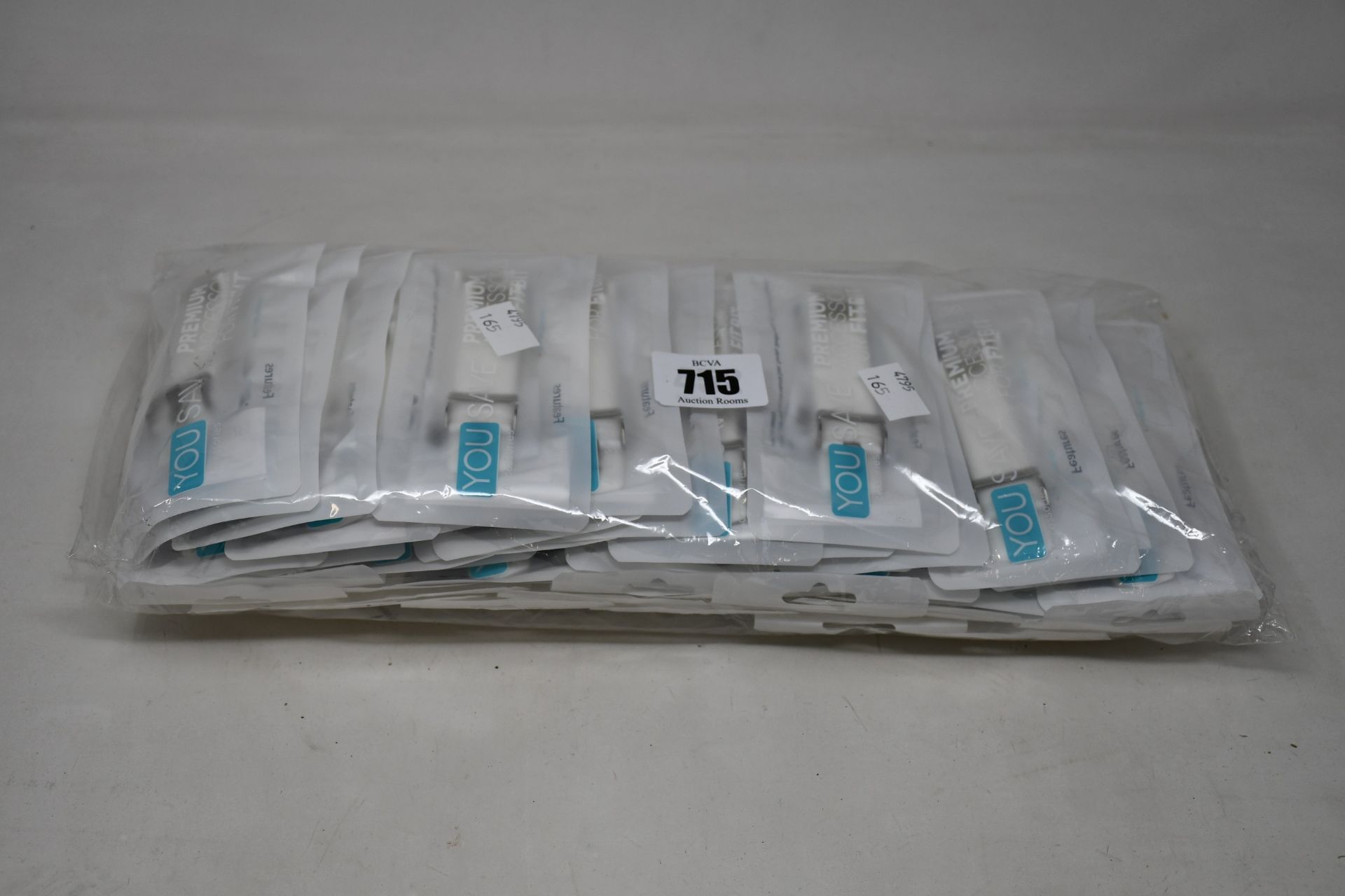 A large quantity of boxed as new Fitbit classic buckle silicone wrist straps in white (Approximately