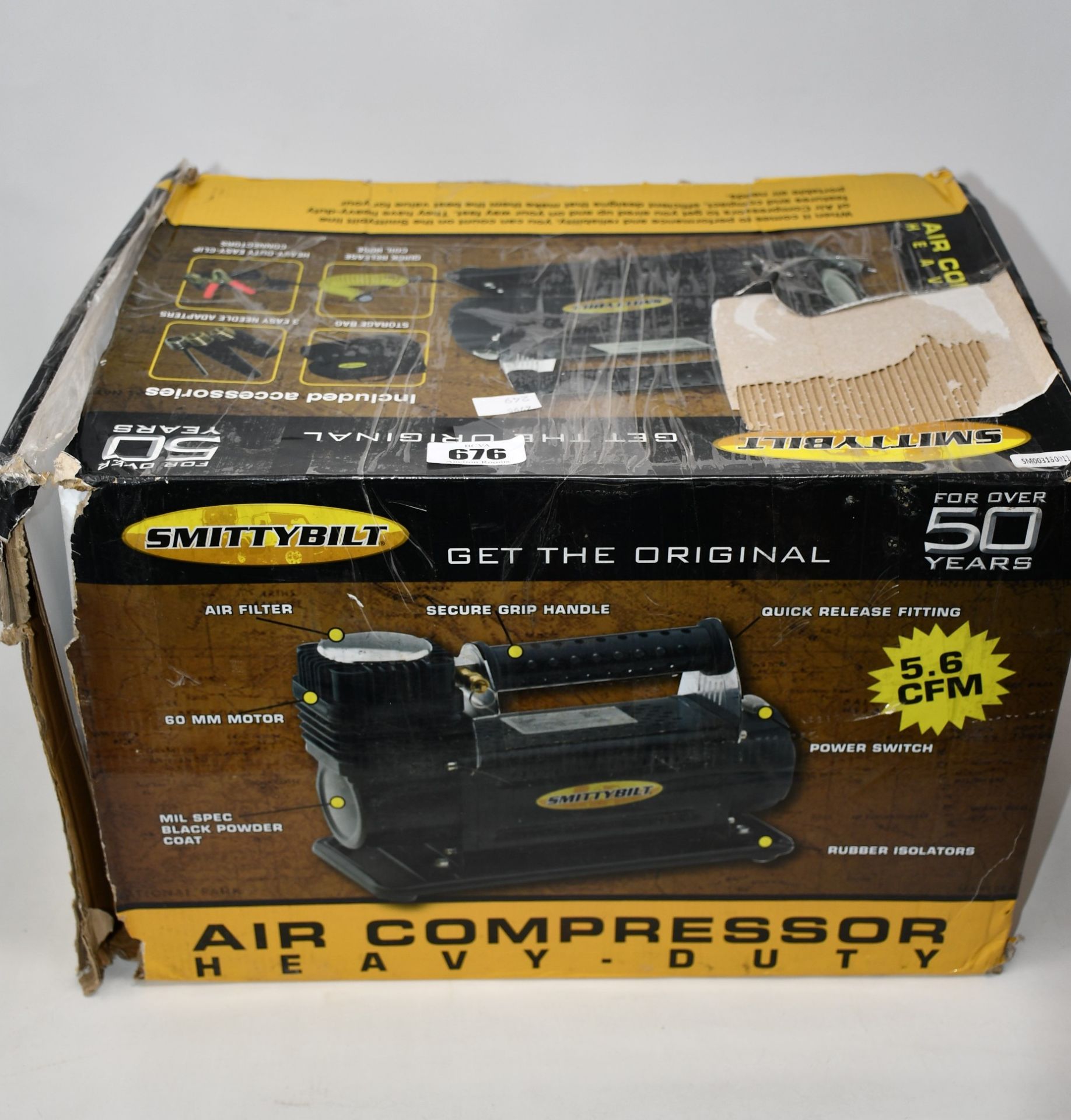 One boxed as new Smittybilt high performance air compressor (Model: 2781).