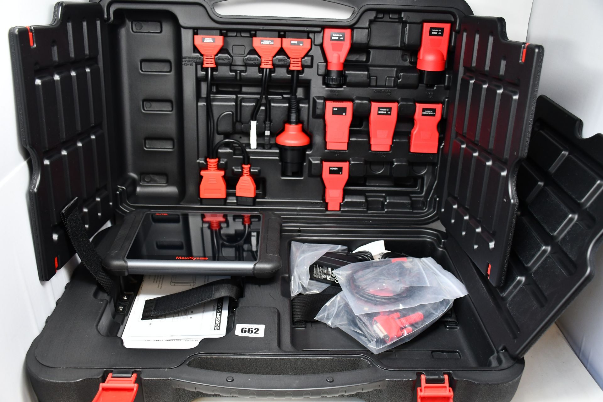 A boxed AUTEL MS906 MaxiSys automotive diagnostic system and scan tool kit.