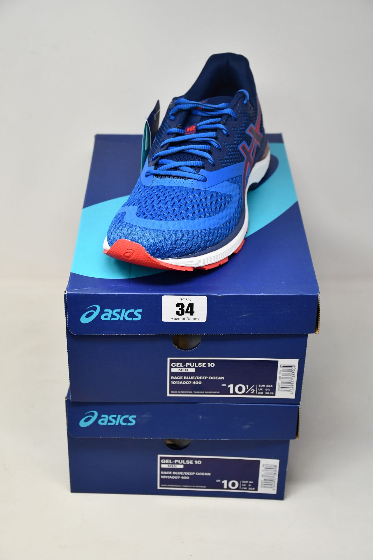 Two pairs of as new Asics Gel-Pulse 10 trainers (UK 9, 9.5).