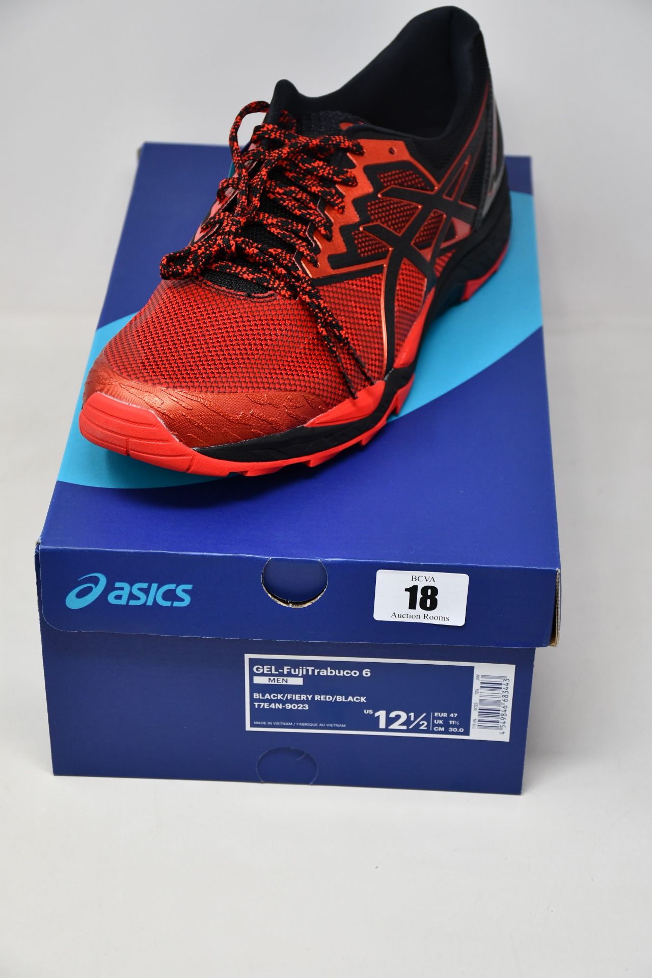 A pair of as new Asics Gel-FujiTrabuco 6 G-TX trainers (UK 11.5).