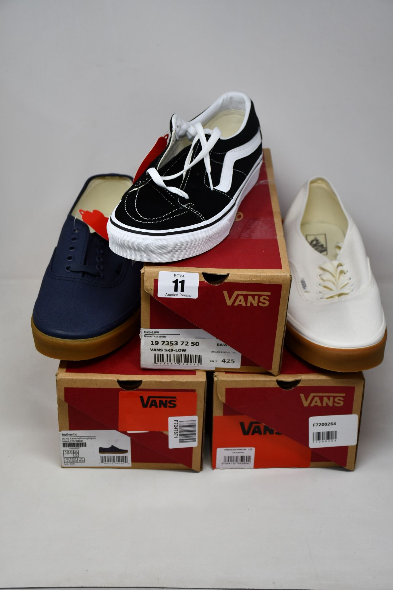 Three pairs of as new Vans; two Authentic (Both UK 11) and Sk8-Low (UK 7).