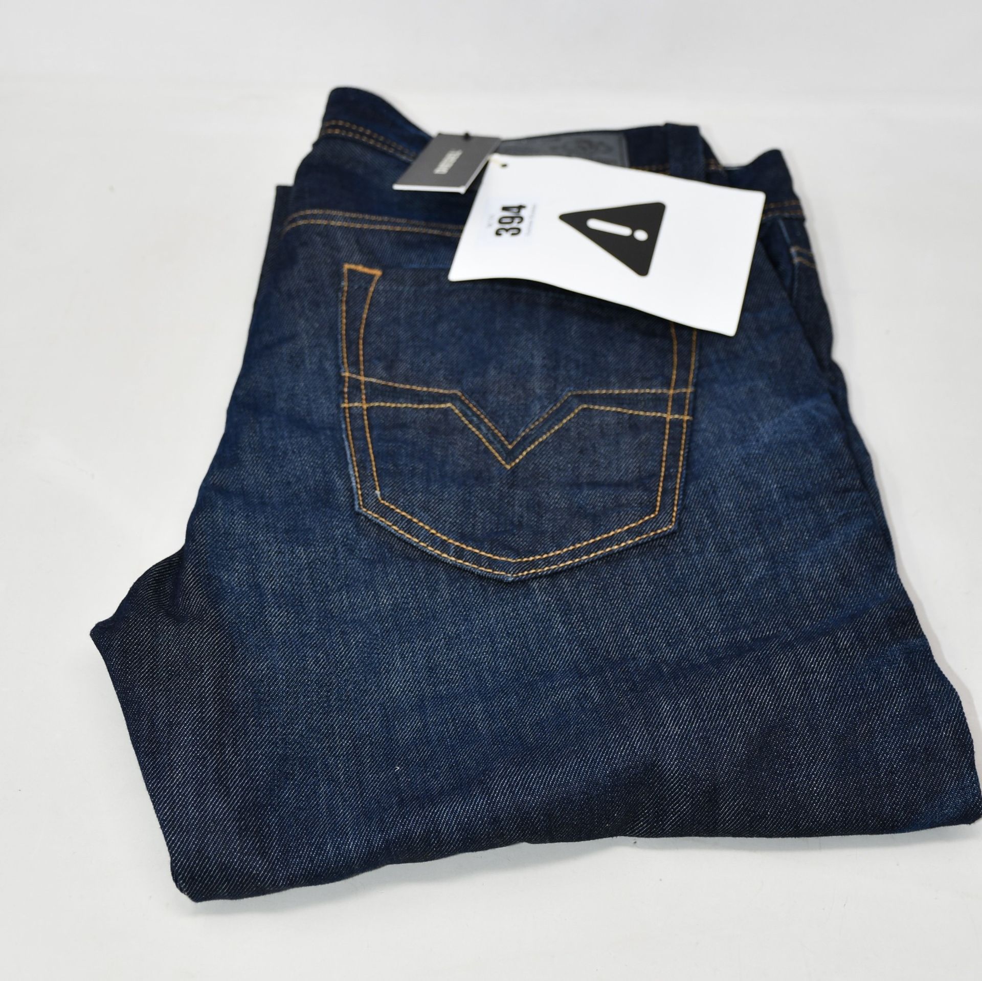 A pair of as new Diesel Larkee jeans (W32/L32).