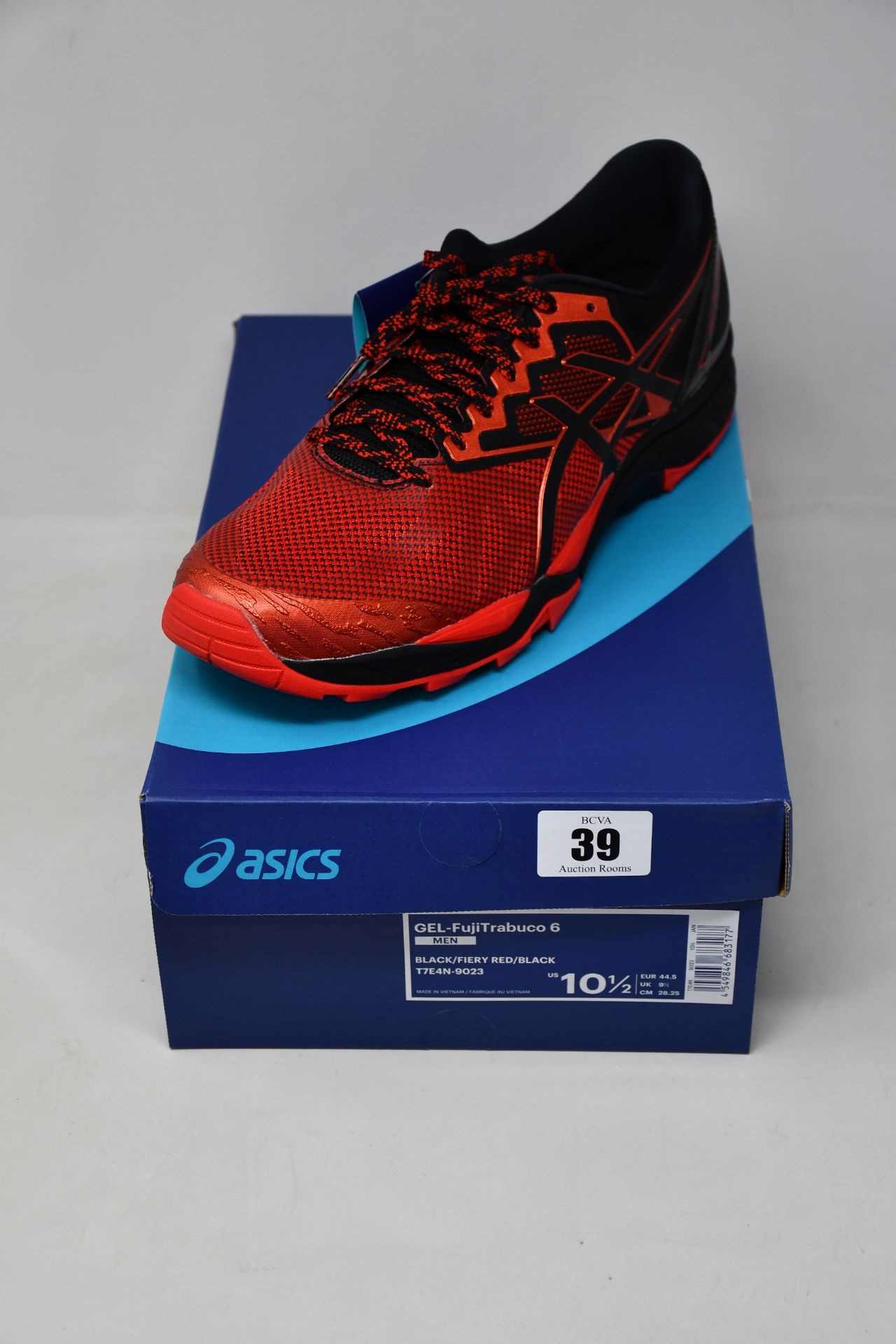 A pair of as new Asics Gel-FujiTrabuco 6 G-TX trainers (UK 9.5).