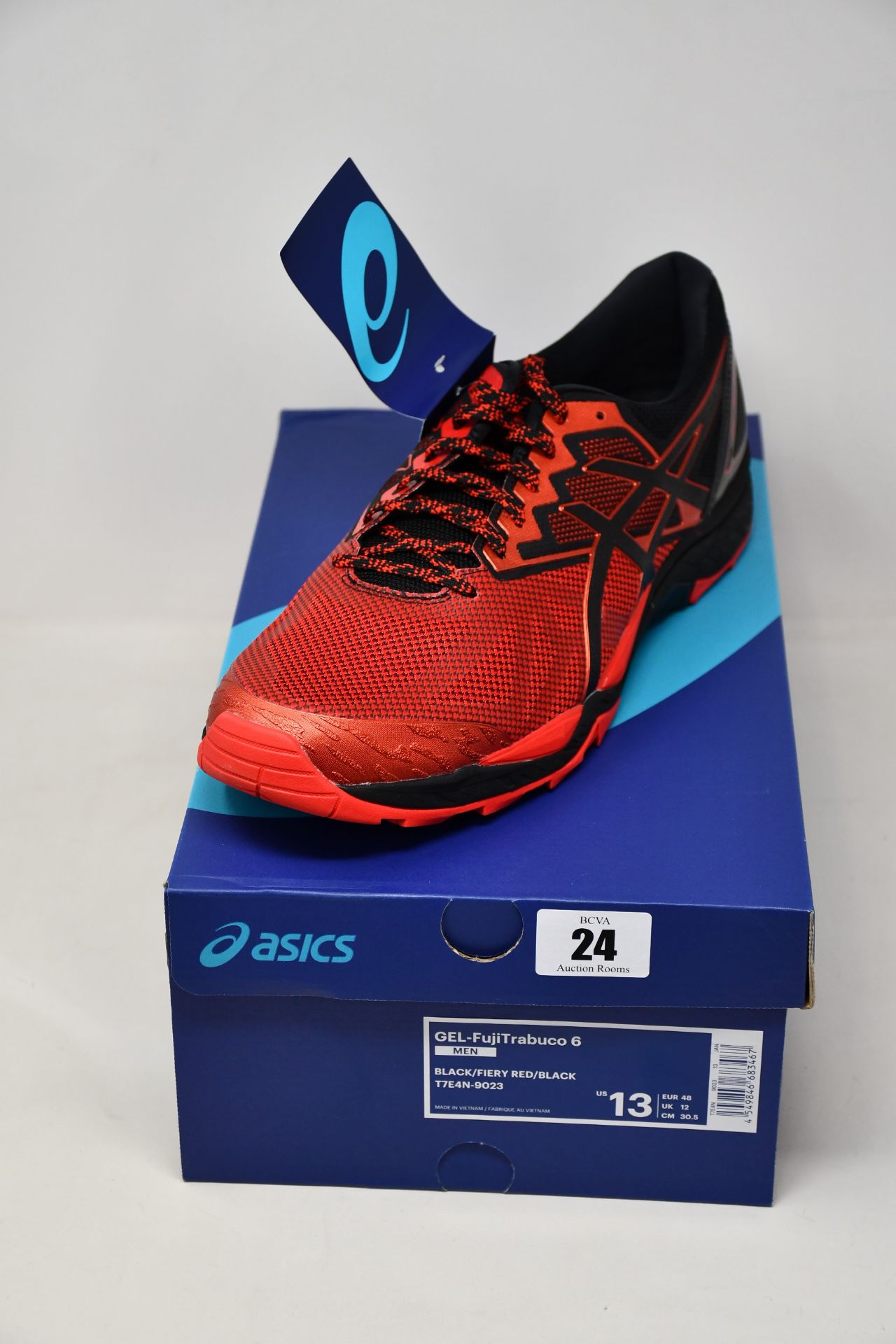 A pair of as new Asics Gel-FujiTrabuco 6 G-TX trainers (UK 12).