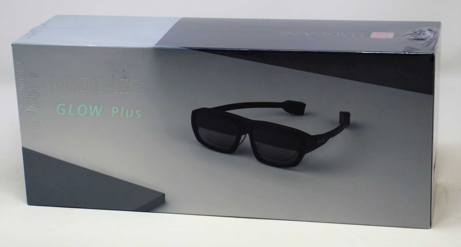 A boxed as new pair of Mad Gaze GLow Plus AR Glasses in Midnight Black (Box sealed).