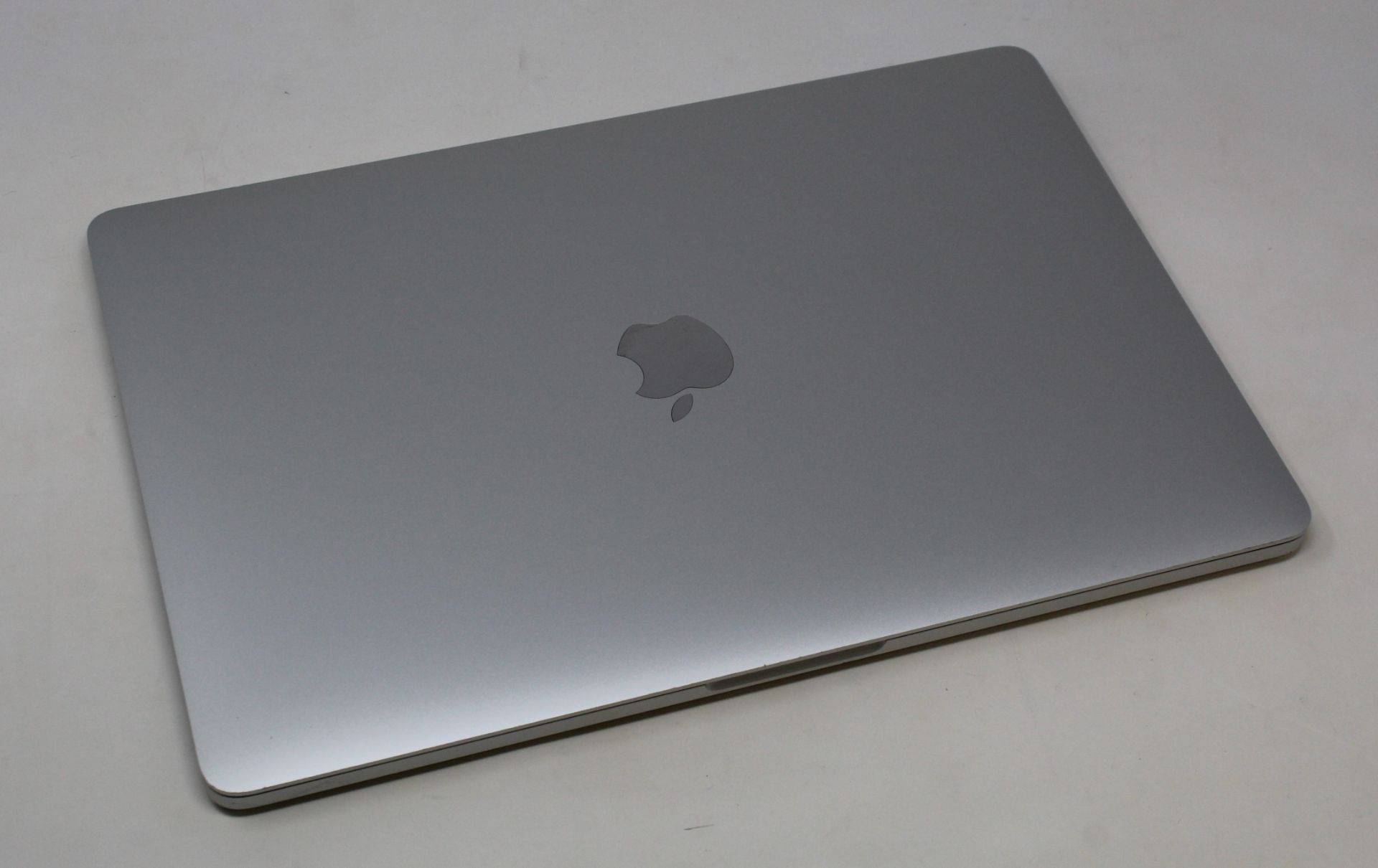 A pre-owned MacBook Pro (13-inch, 2016, Four Thunderbolt 3 Ports) A1706 in Silver with Intel Core i5 - Image 2 of 7