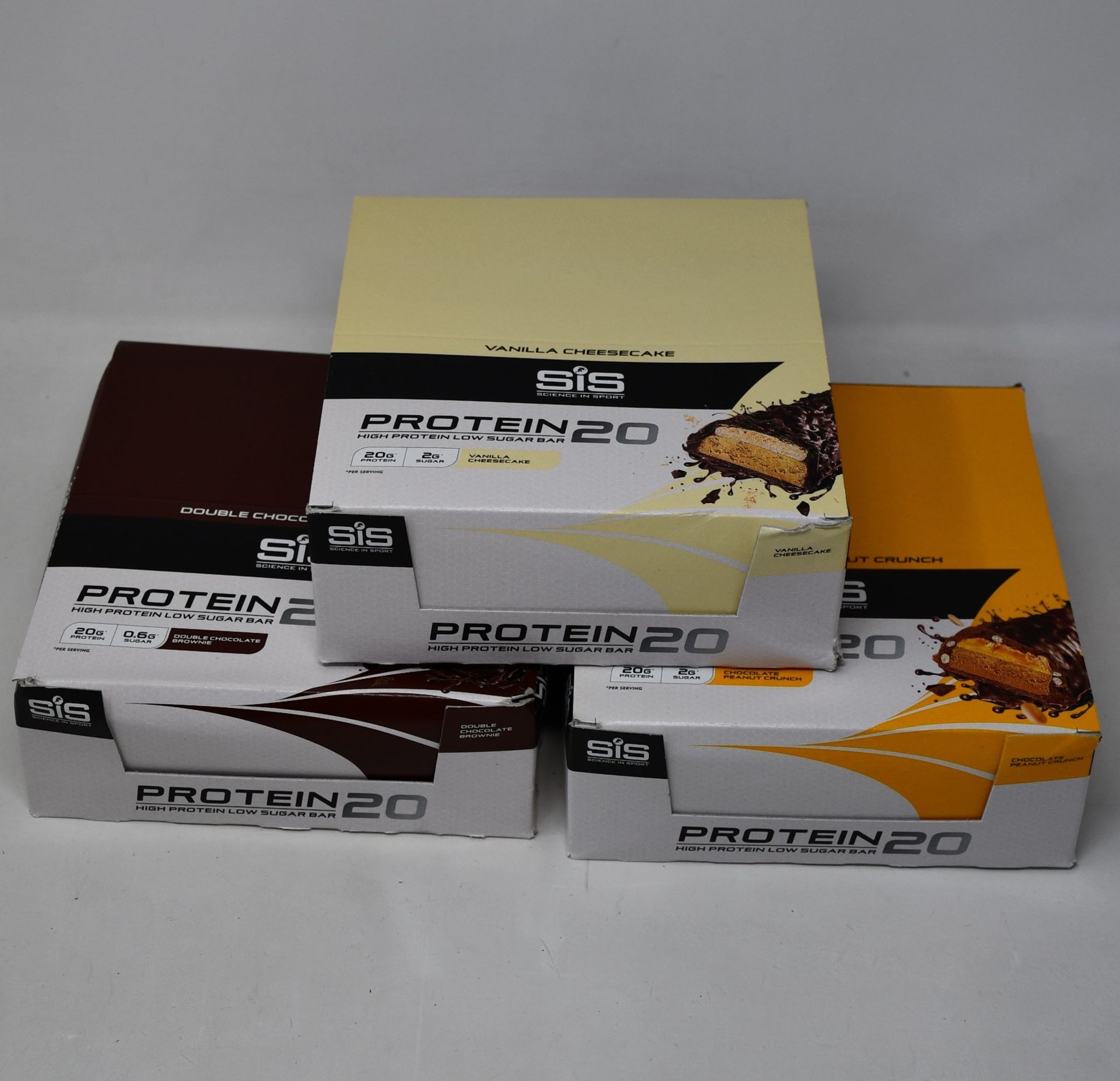 Six boxes of twelve Science In Sport Protein20 high protein low sugar bars (2 vanilla cheesecake,