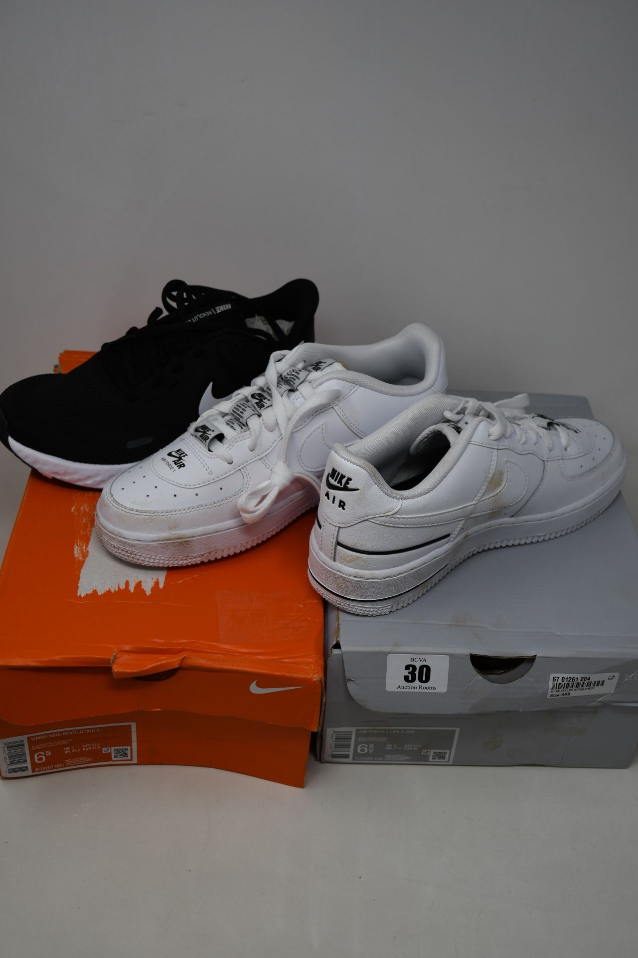 Two pairs of as new Nike trainers; Air Force 1 LV8 (UK 6) and women's Revolution 5 (UK 4) (Nike