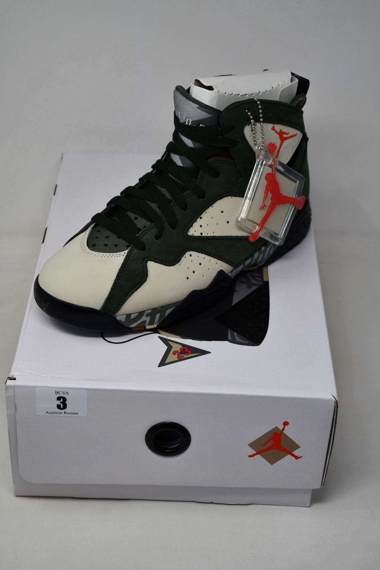 A pair of as new Nike Air Jordan 7 Retro Patta trainers (UK 6).