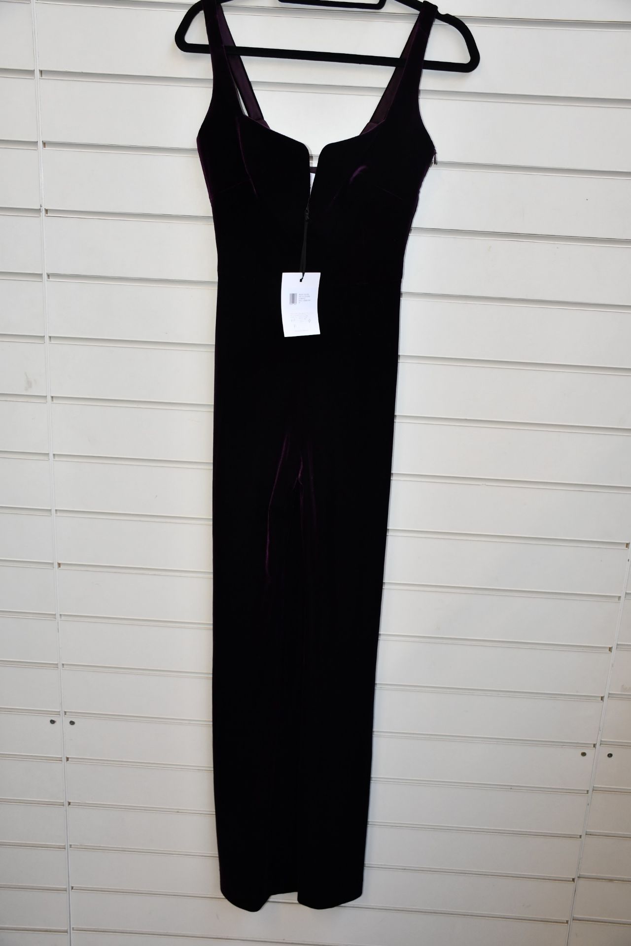 An as new Galvan Velvet Eclipse jumpsuit in aubergine (Size 40 - RRP £1.095).