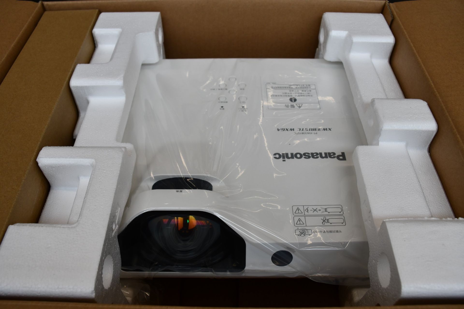 A boxed as new Panasonic PT-XW3381STC Short Throw Projector (Non English (Chinese or Japanese) model