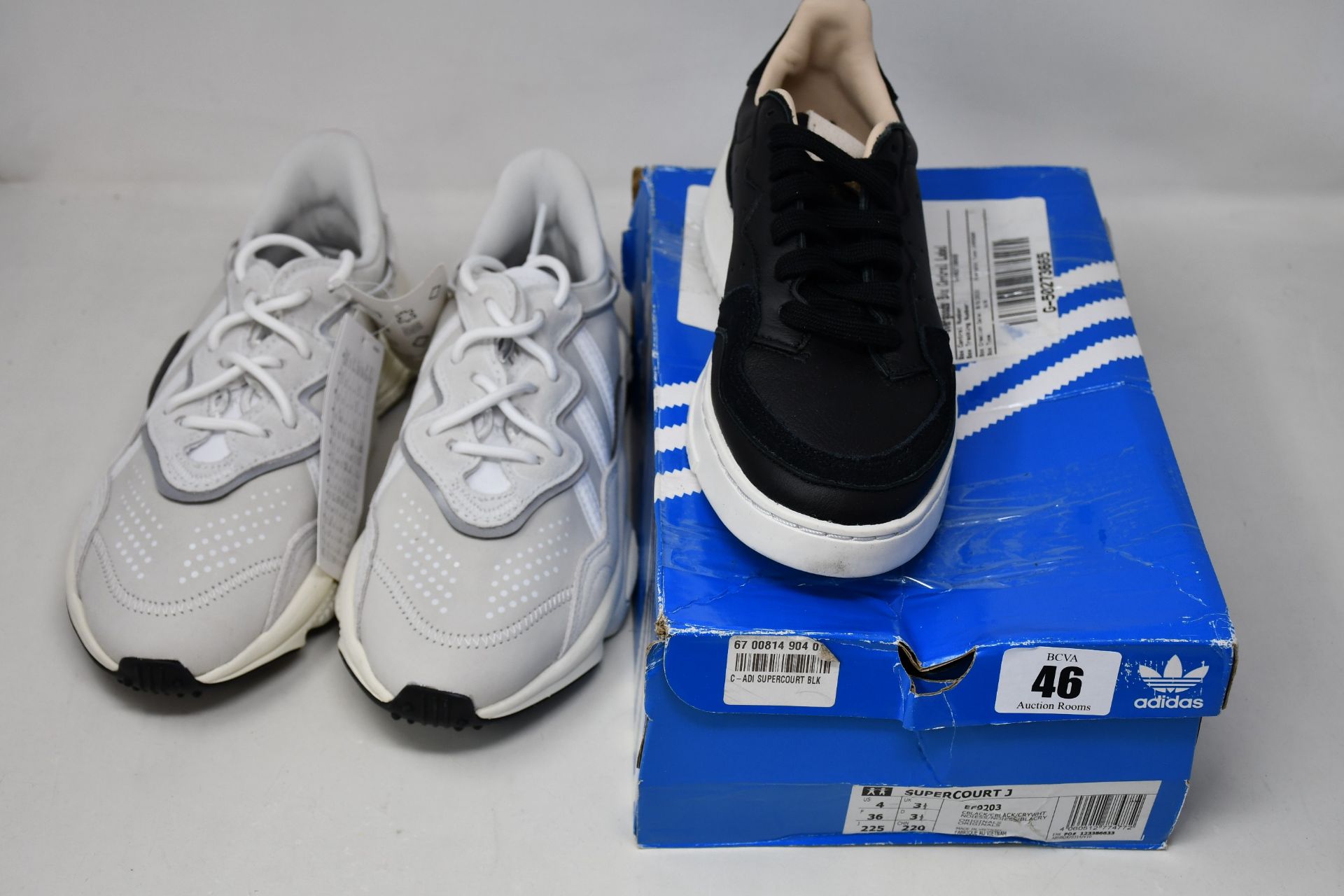 Two pairs of as new Junior Adidas trainers; Ozweego (UK 5 - No box, slight marks on top of back