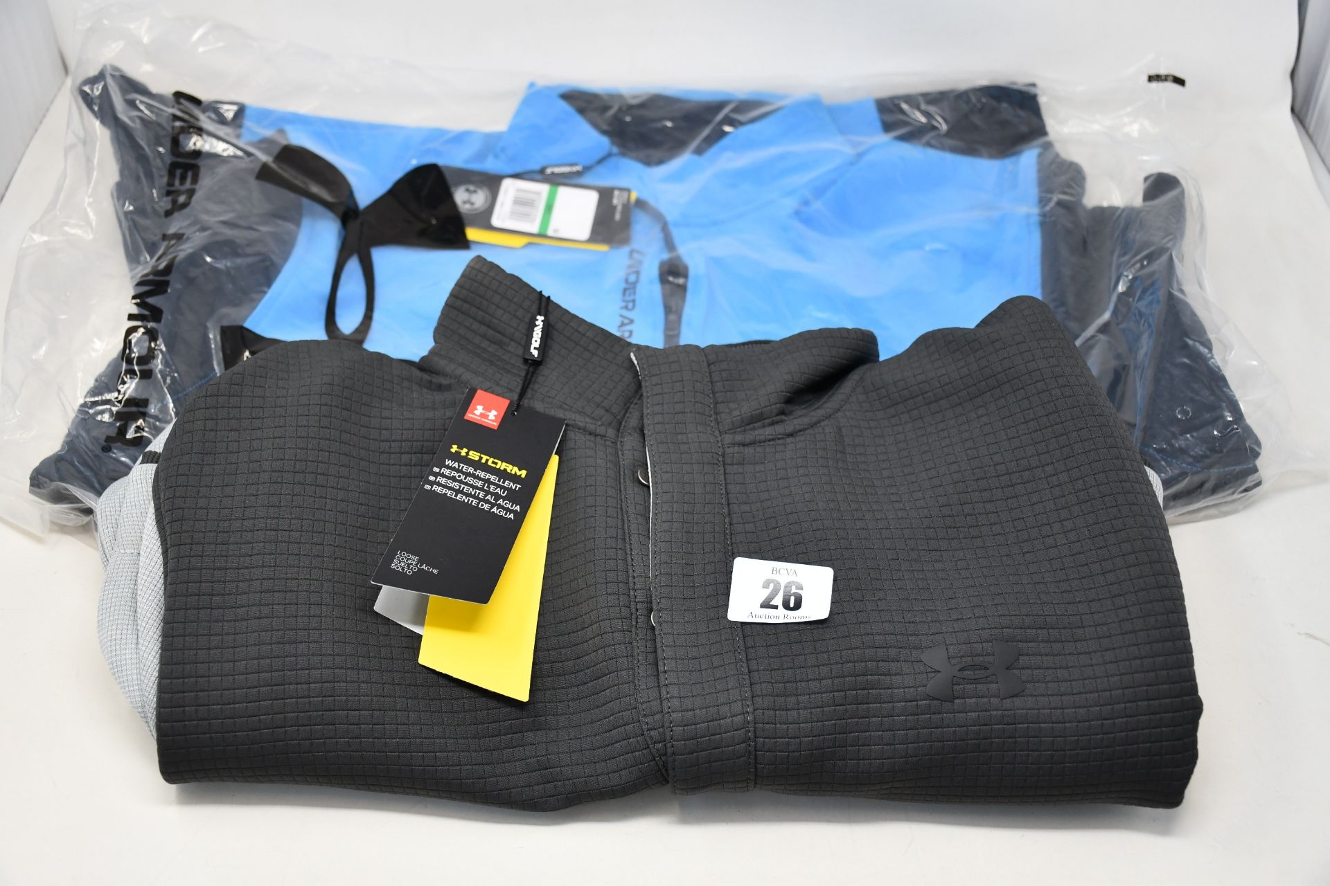 An as new Under Armour Storm SF 1/2 snap stretch water repellent golf sweater (L - RRP £55) and