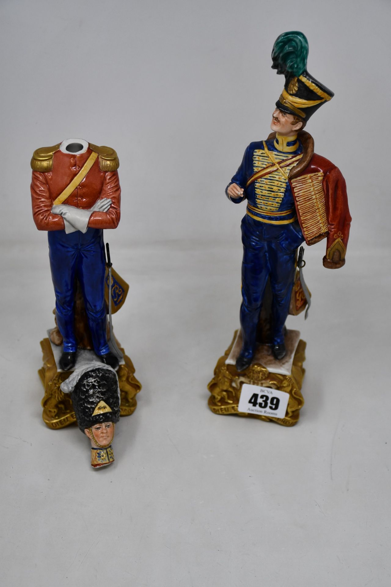 Two Bruno Merli designed soldier figurines (One in good condition, one with separated head, but