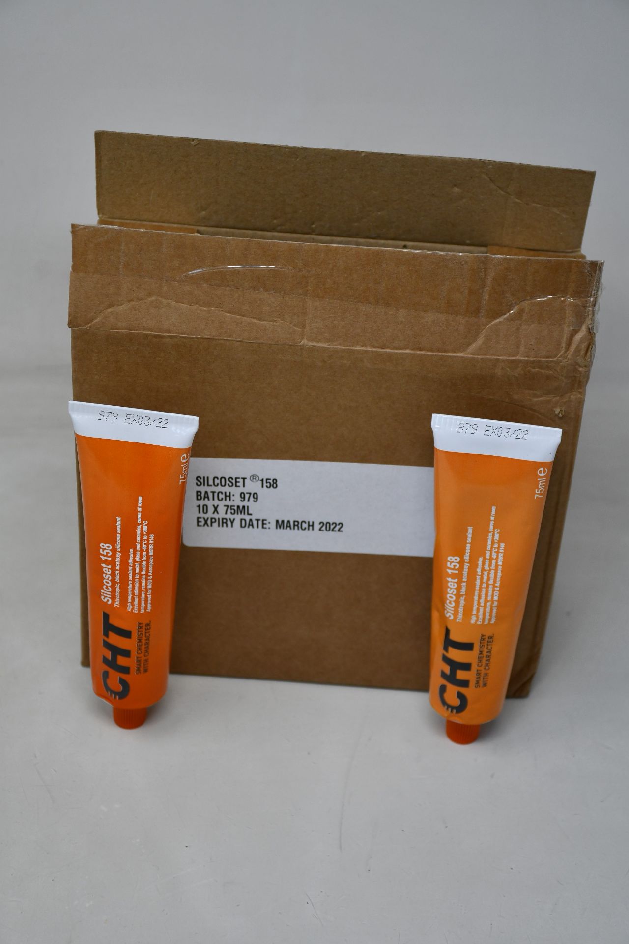 Ten boxed as new CHT Silcoset 158 (Thixotropic, black acetoxy silicone sealant).