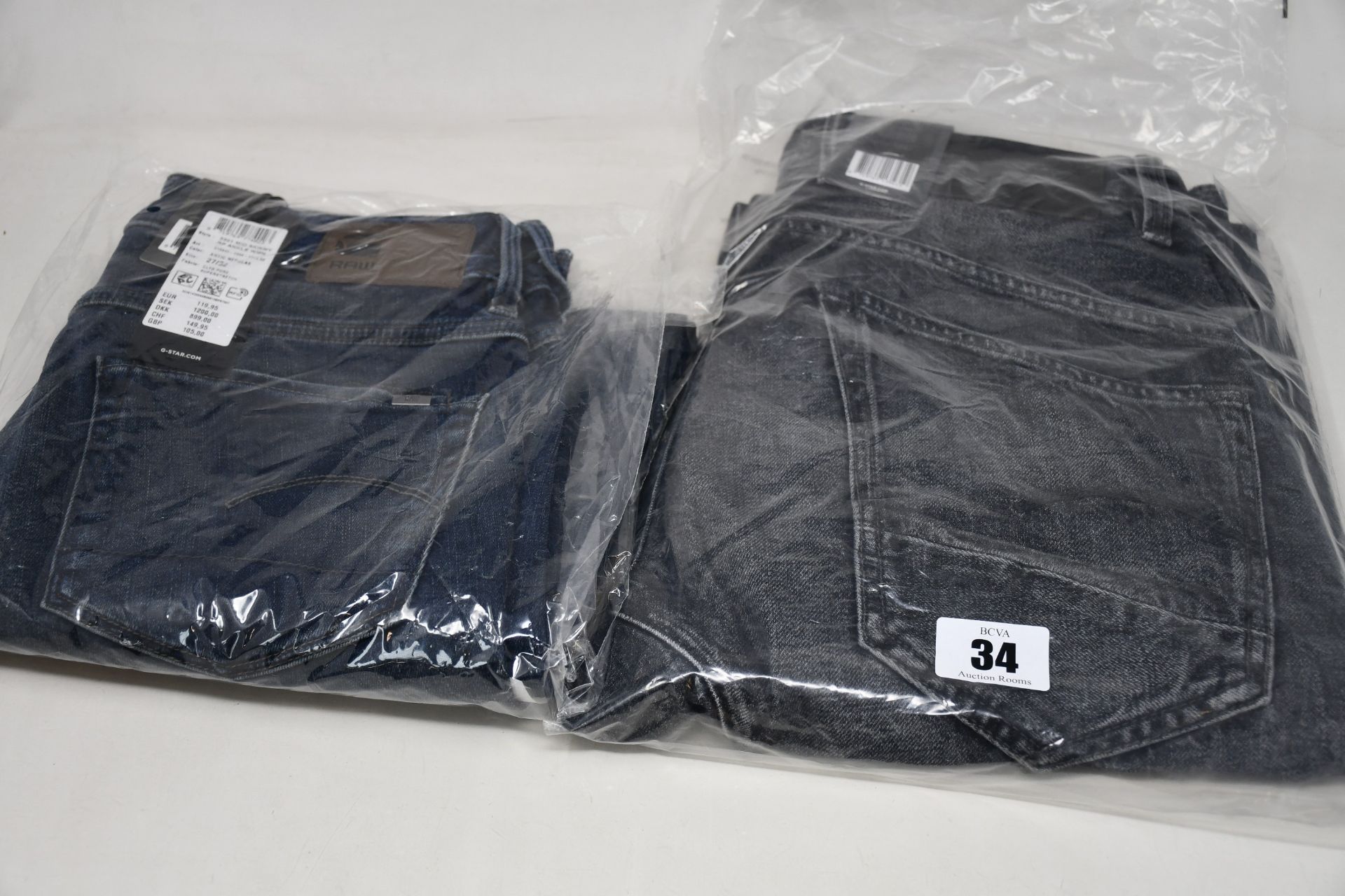 Four pairs of as new G Star Raw jeans (W25/L30, W27/L28, 2 x W27/L32).