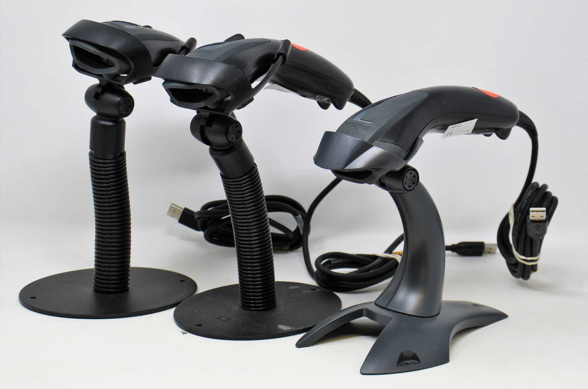 Three pre-owned Honeywell 1400g USB Barcode Scanners with stands.
