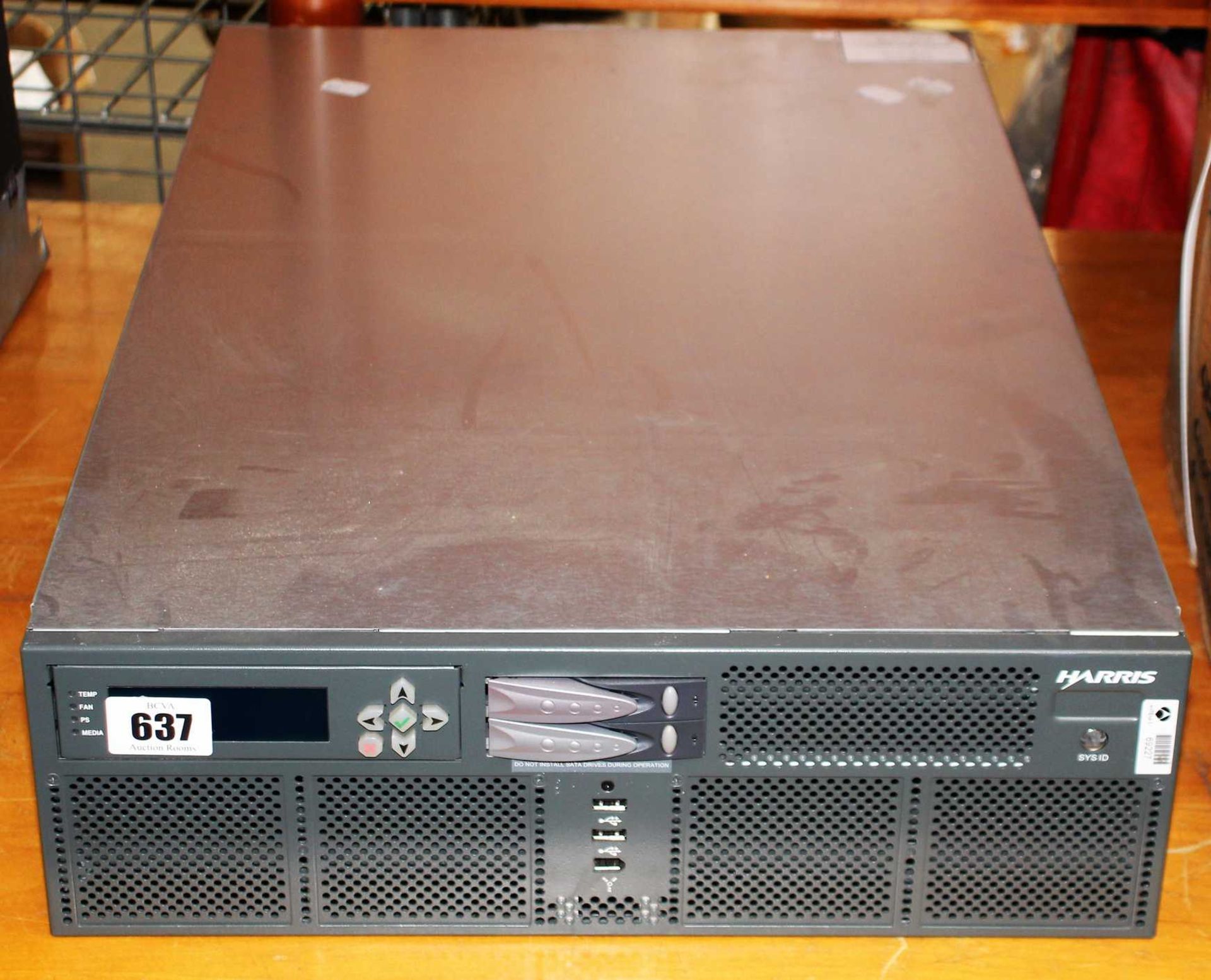 A pre-owned Leitch Technology Harris NXAMP3801HDX Media Server (Hard drives removed. Untested,