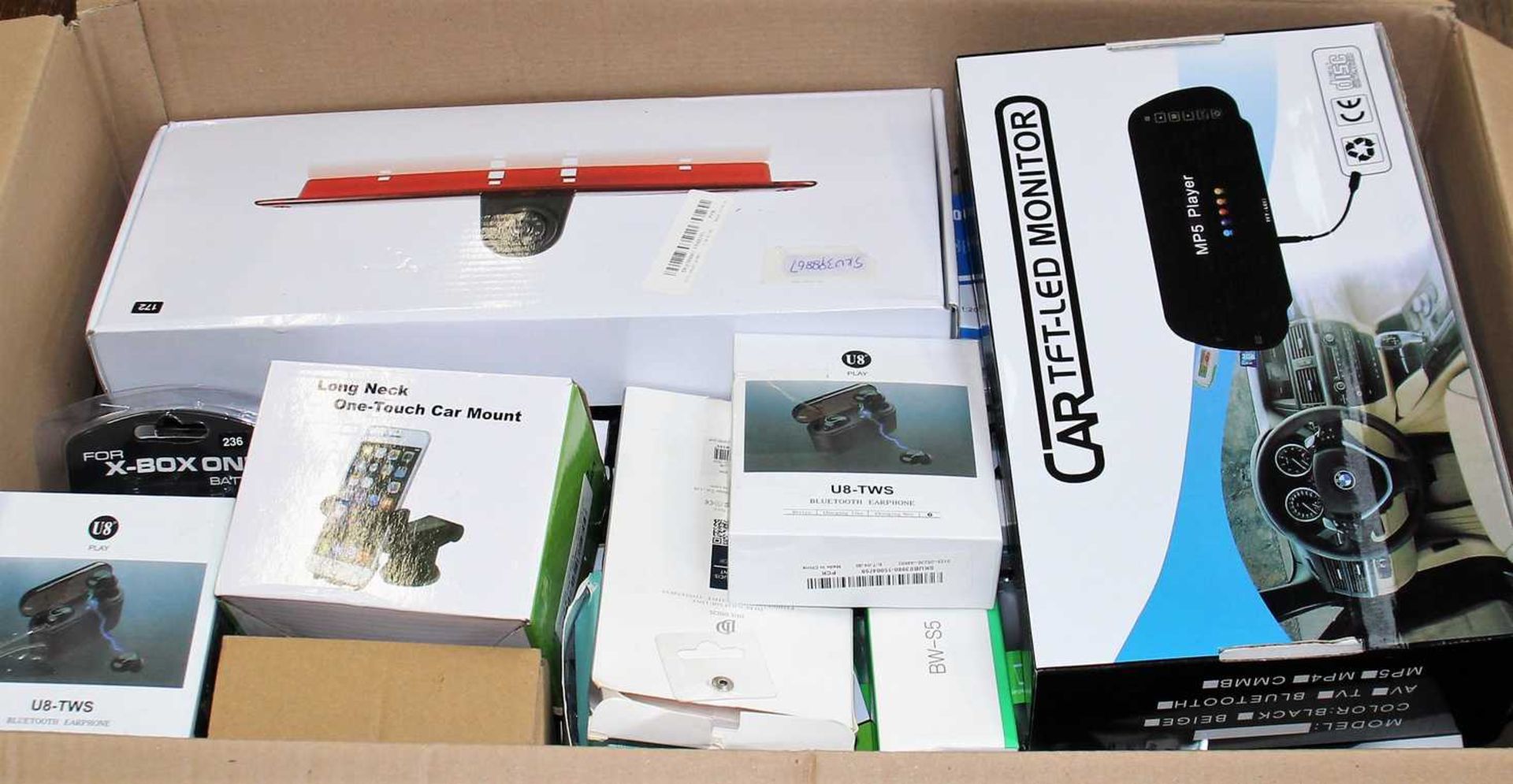 A box of assorted as new electrical items and accessories to include Bluetooth Headphones, XBox