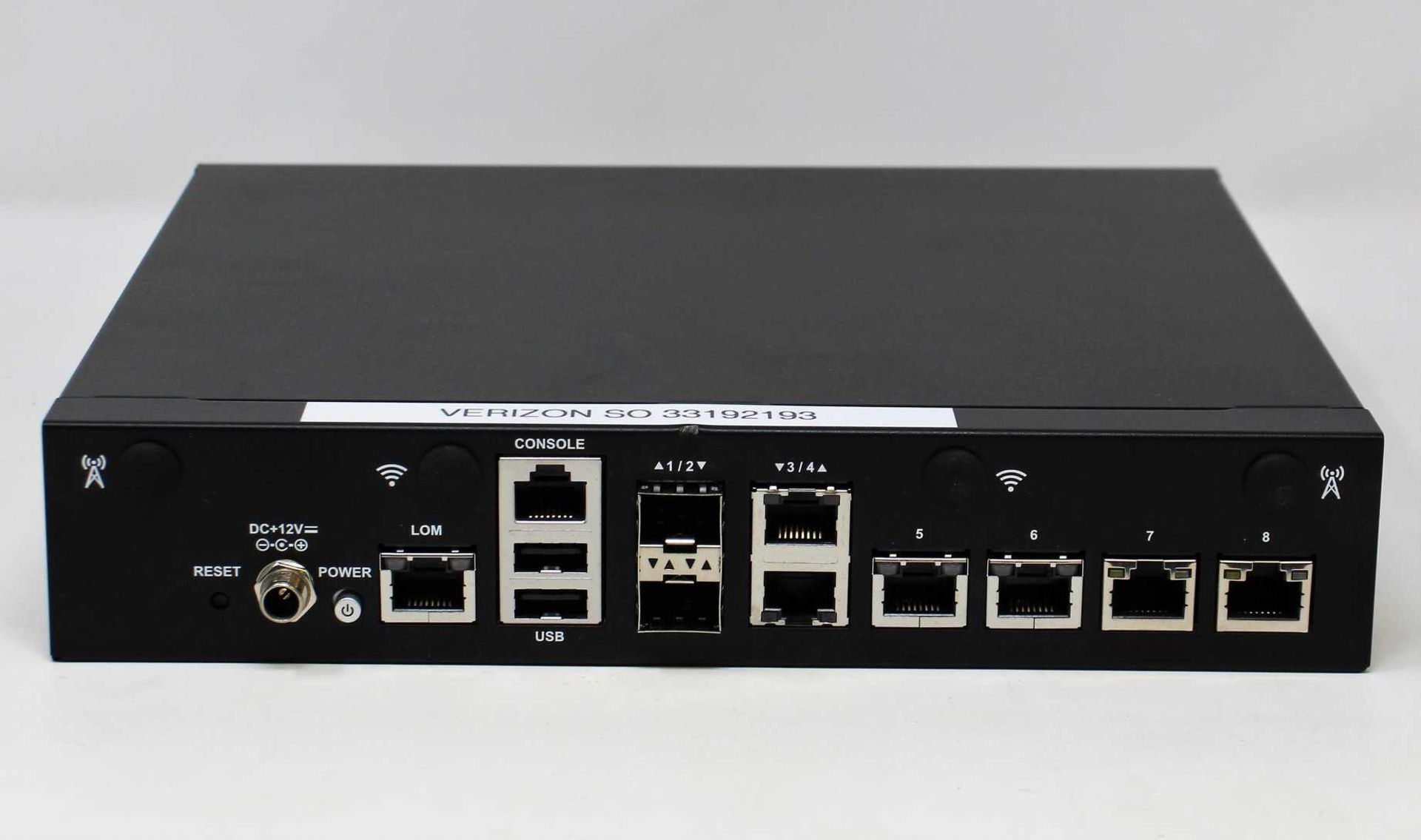 A pre-owned Lanner NCA-1515A-VZ1-PB Desktop Network Appliance (Boxed with power supply and cables).