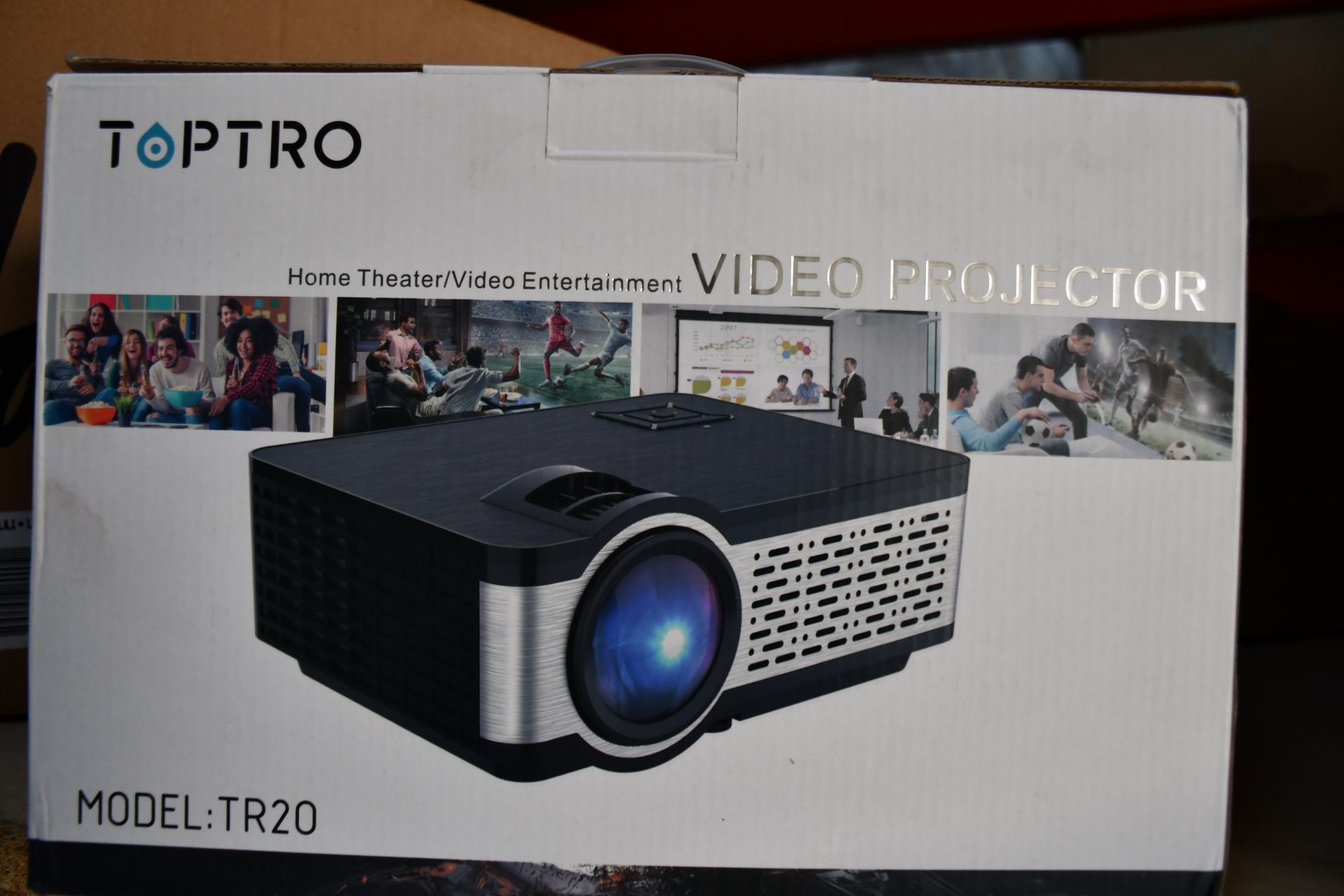 A boxed as new Toptra video projector (Model TR20).