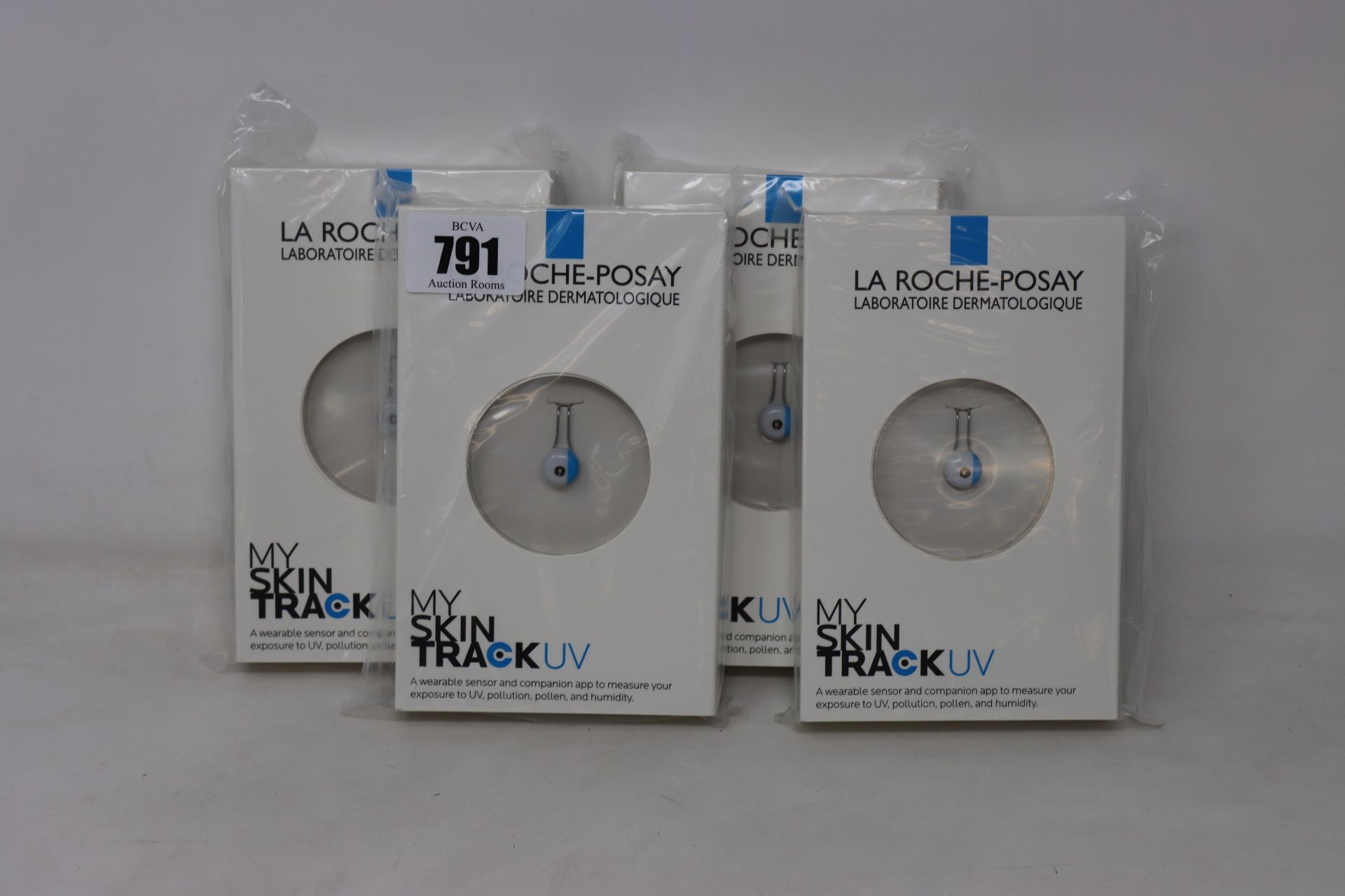 Four boxed as new La Roche-Posay My Skin Track UV wearable sensors.