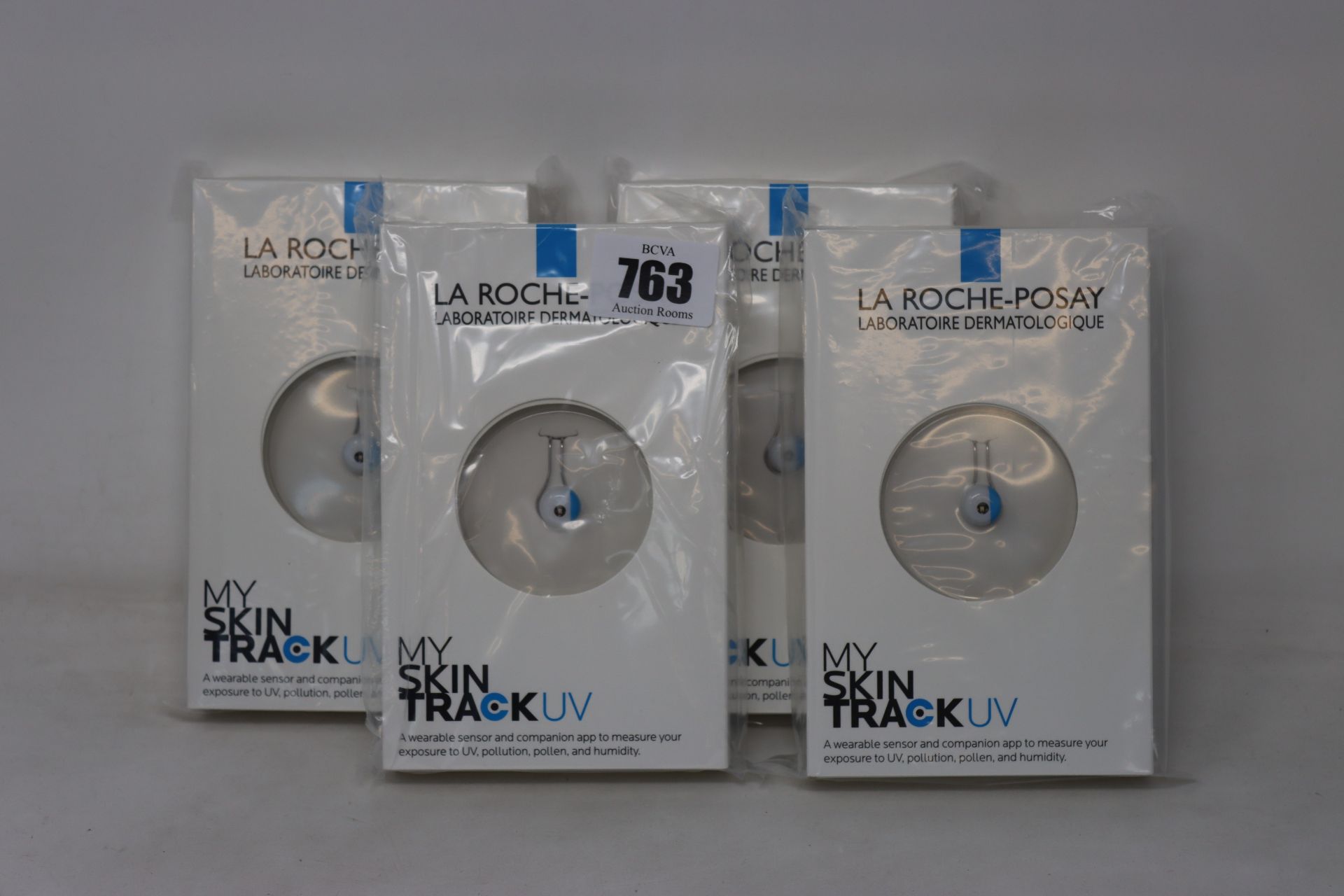 Four boxed as new La Roche-Posay My Skin Track UV wearable sensors.