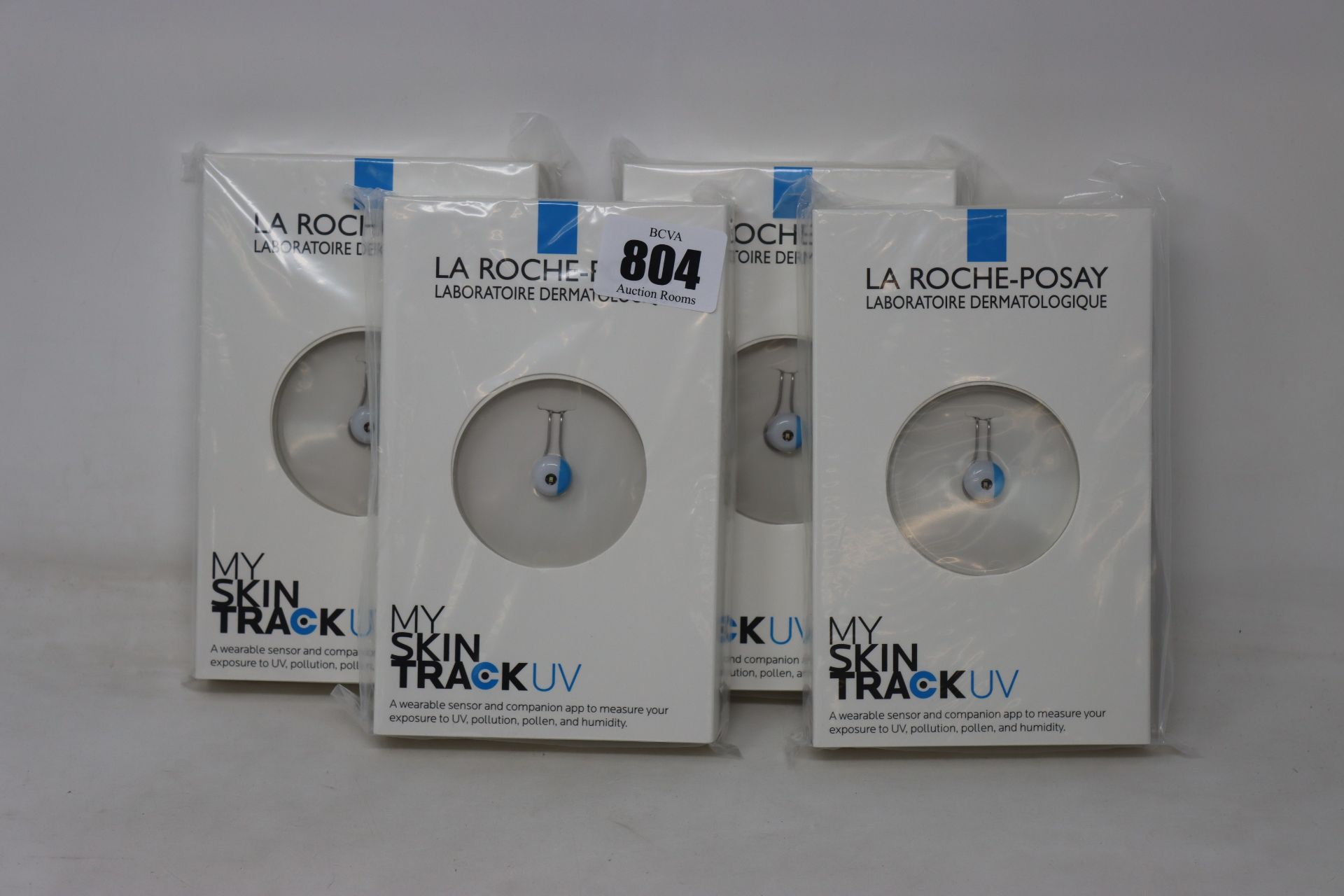 Four boxed as new La Roche-Posay My Skin Track UV wearable sensors.