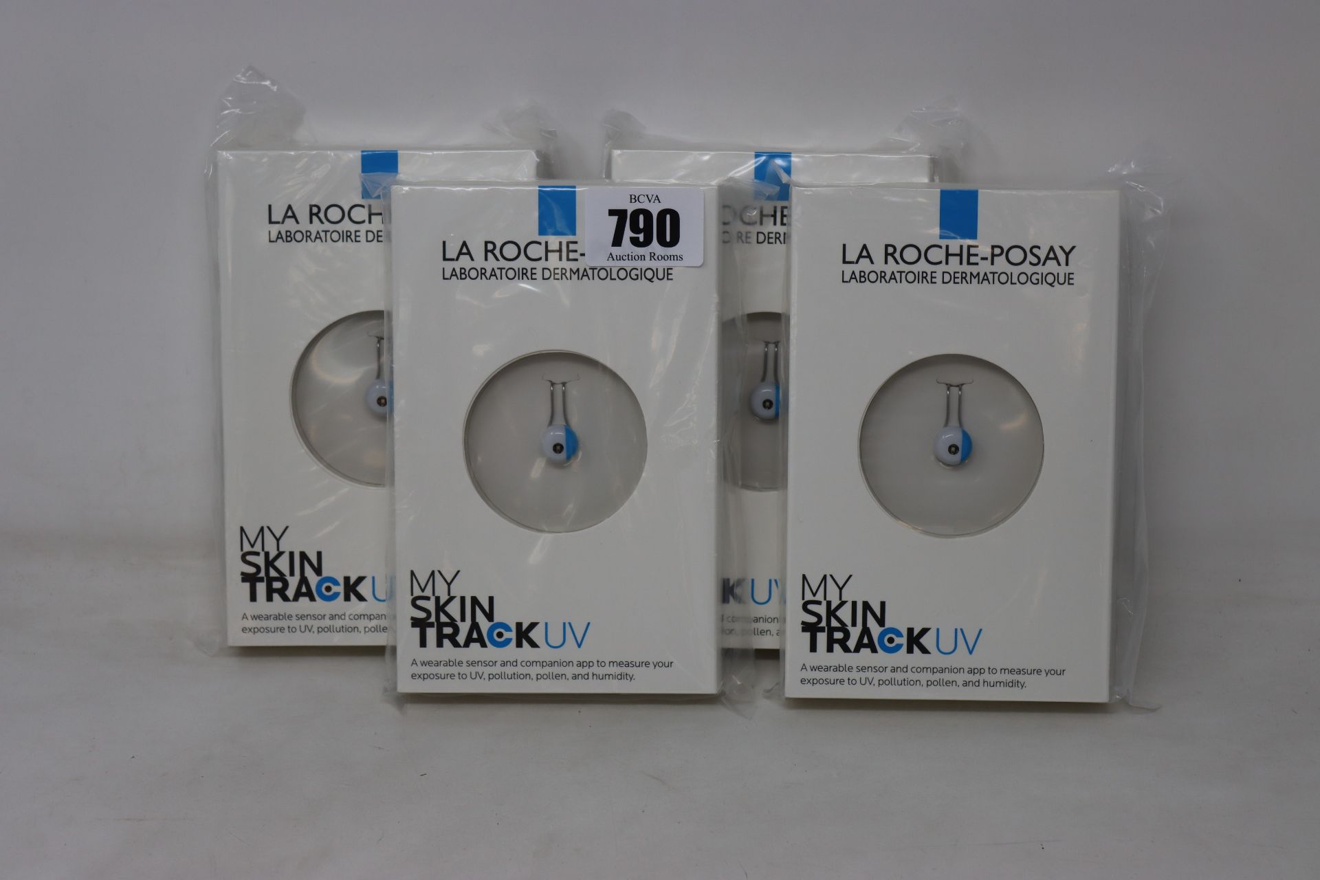 Four boxed as new La Roche-Posay My Skin Track UV wearable sensors.