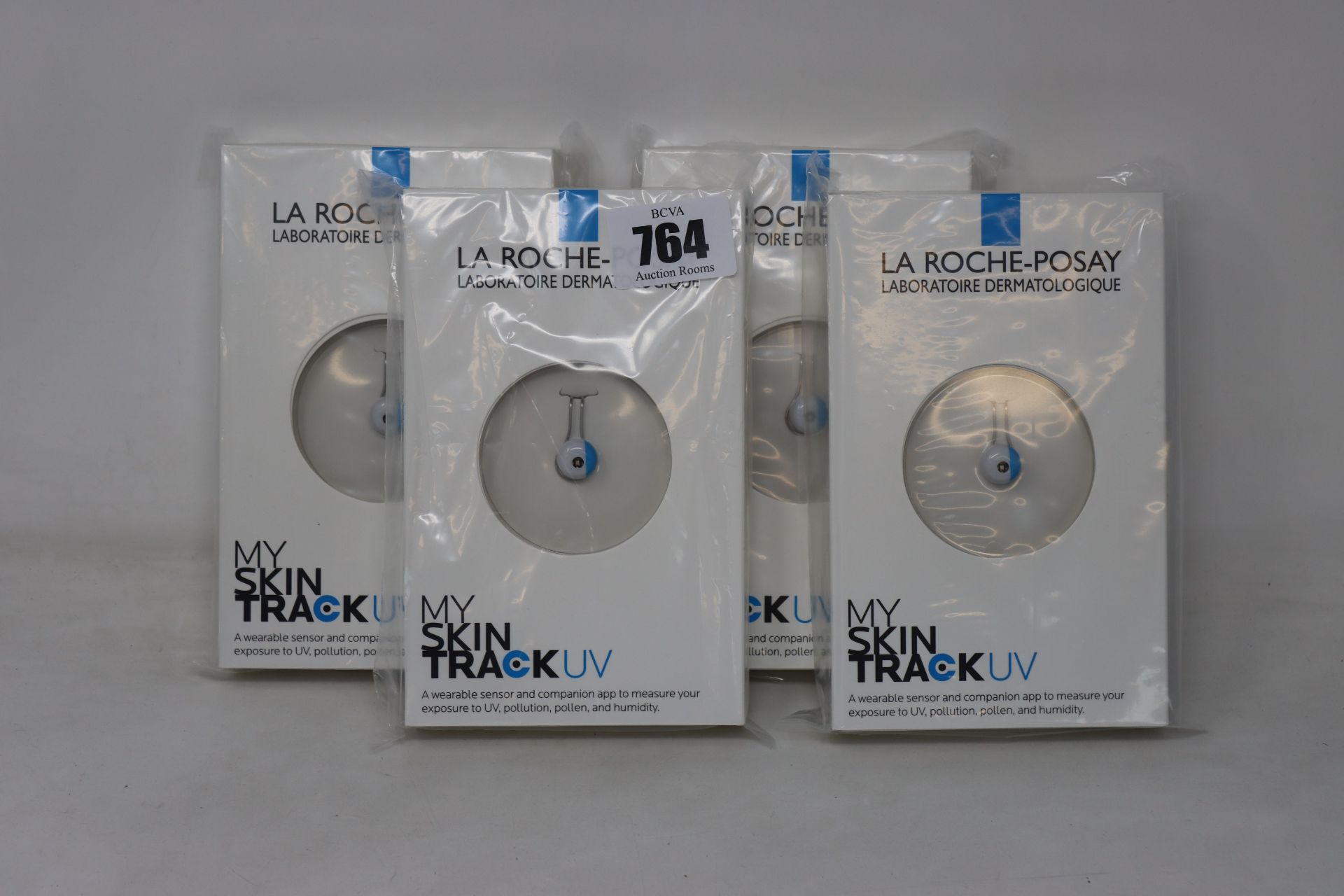 Four boxed as new La Roche-Posay My Skin Track UV wearable sensors.