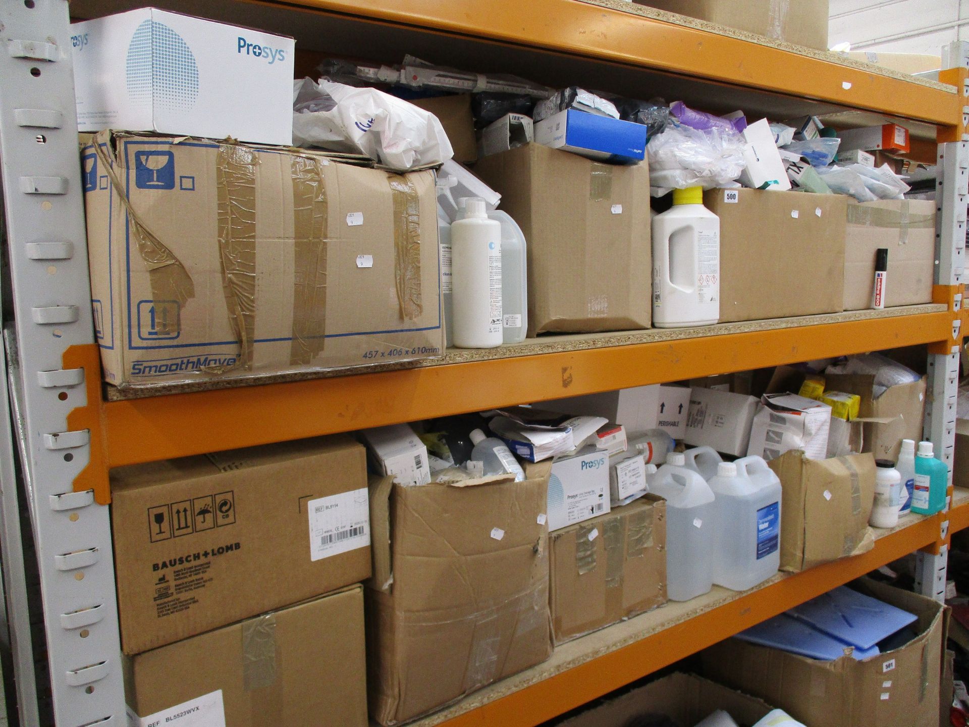 Two shelves of assorted medical and related items to include gloves, hand sanitizer and soap.