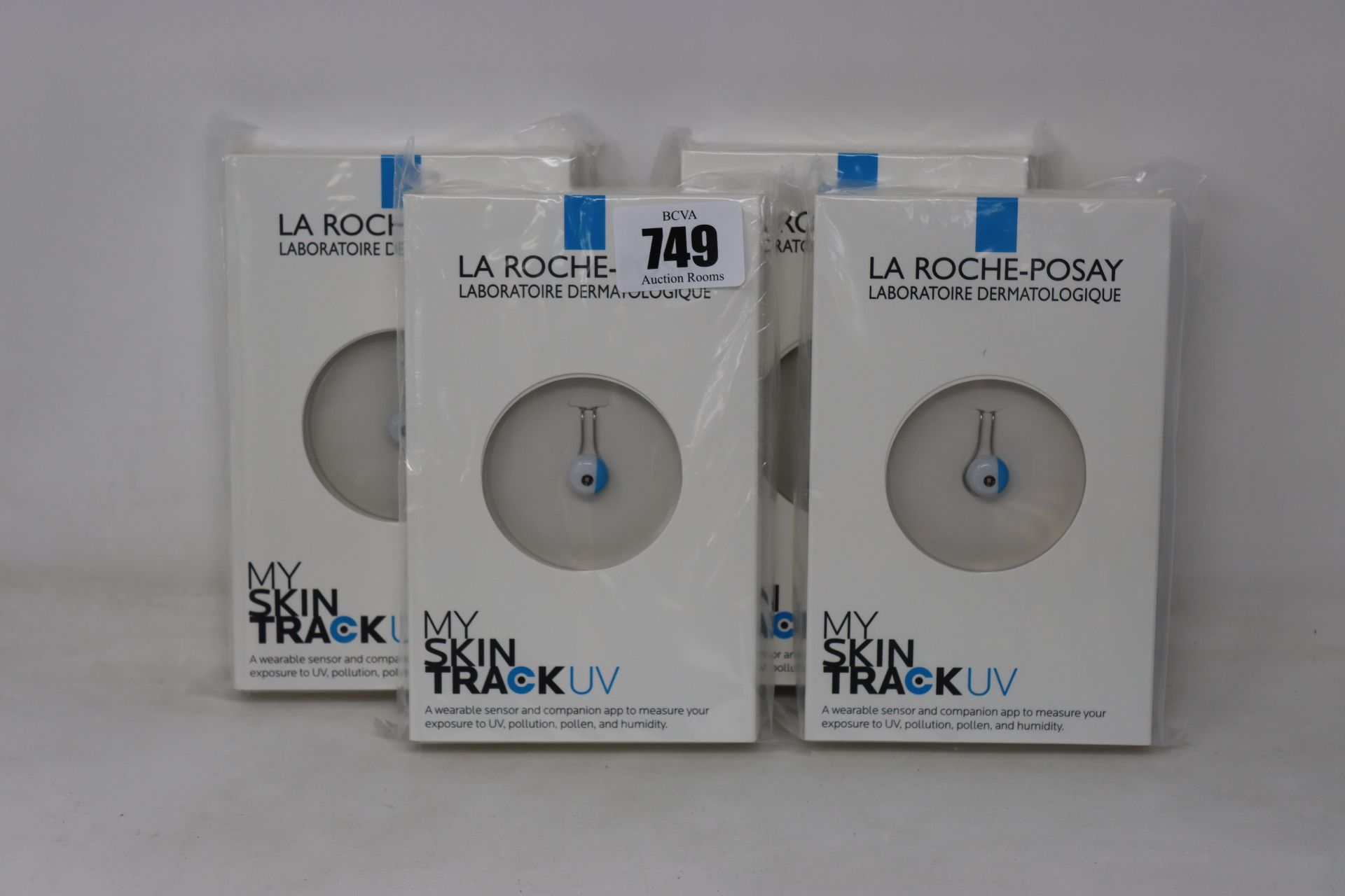 Four boxed as new La Roche-Posay My Skin Track UV wearable sensors.