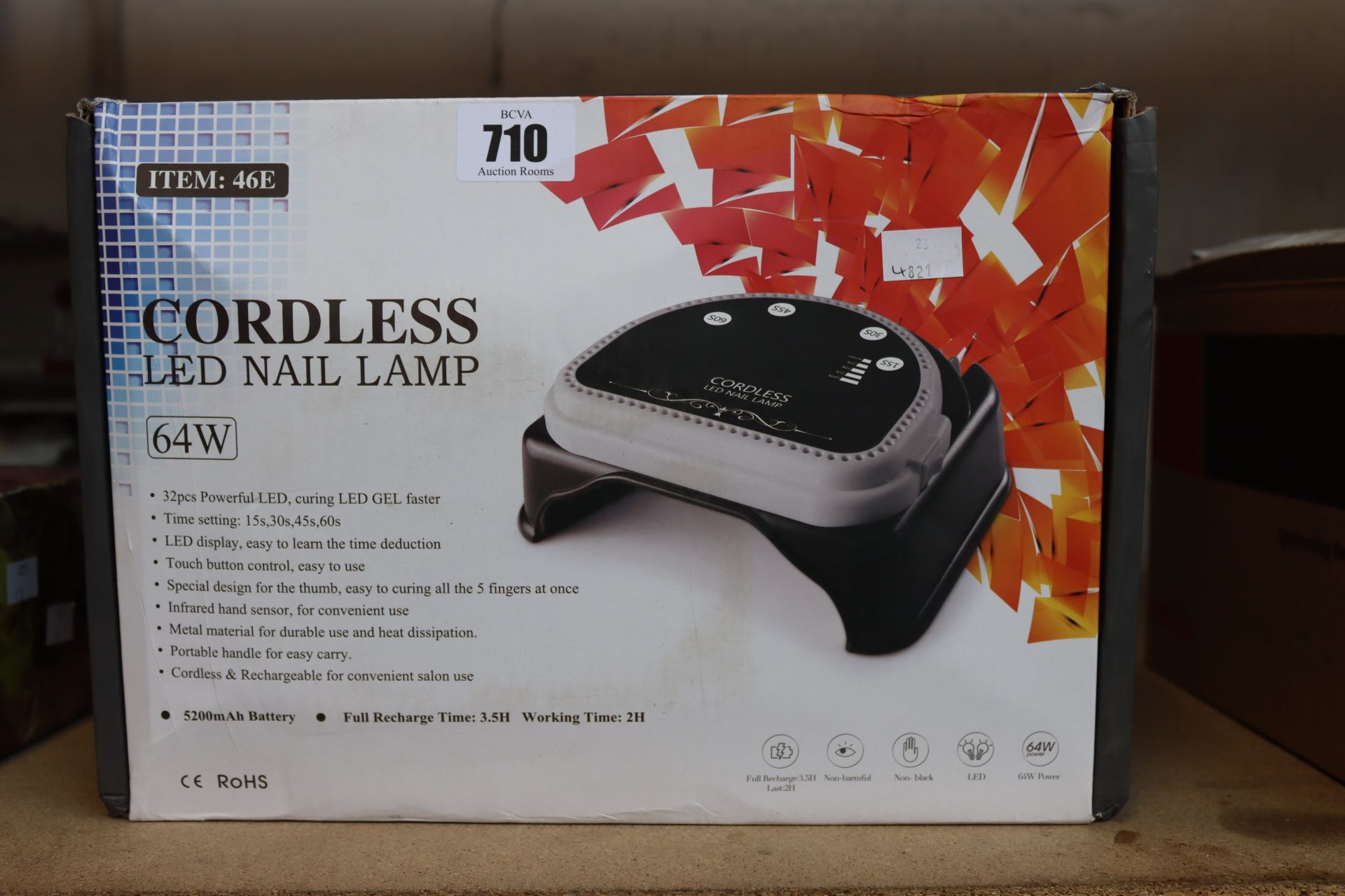 A boxed as new 64W cordless rechargeable LED nail lamp light gel polish nail dryer timer beauty.