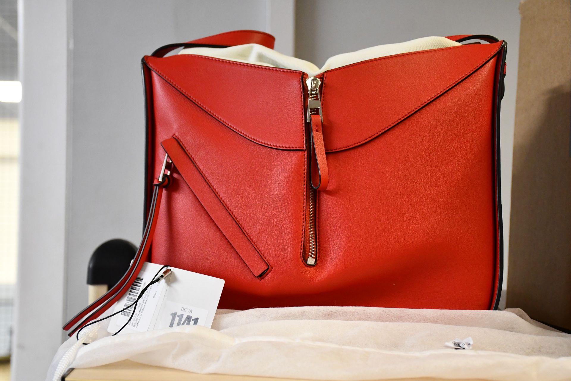 An as new Loewe small Hammock bag in red (RRP £1850).