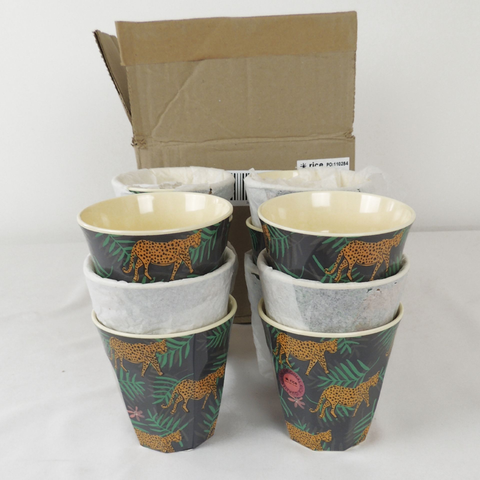 Twelve boxed as new Rice melamine cups in leopard and leaves