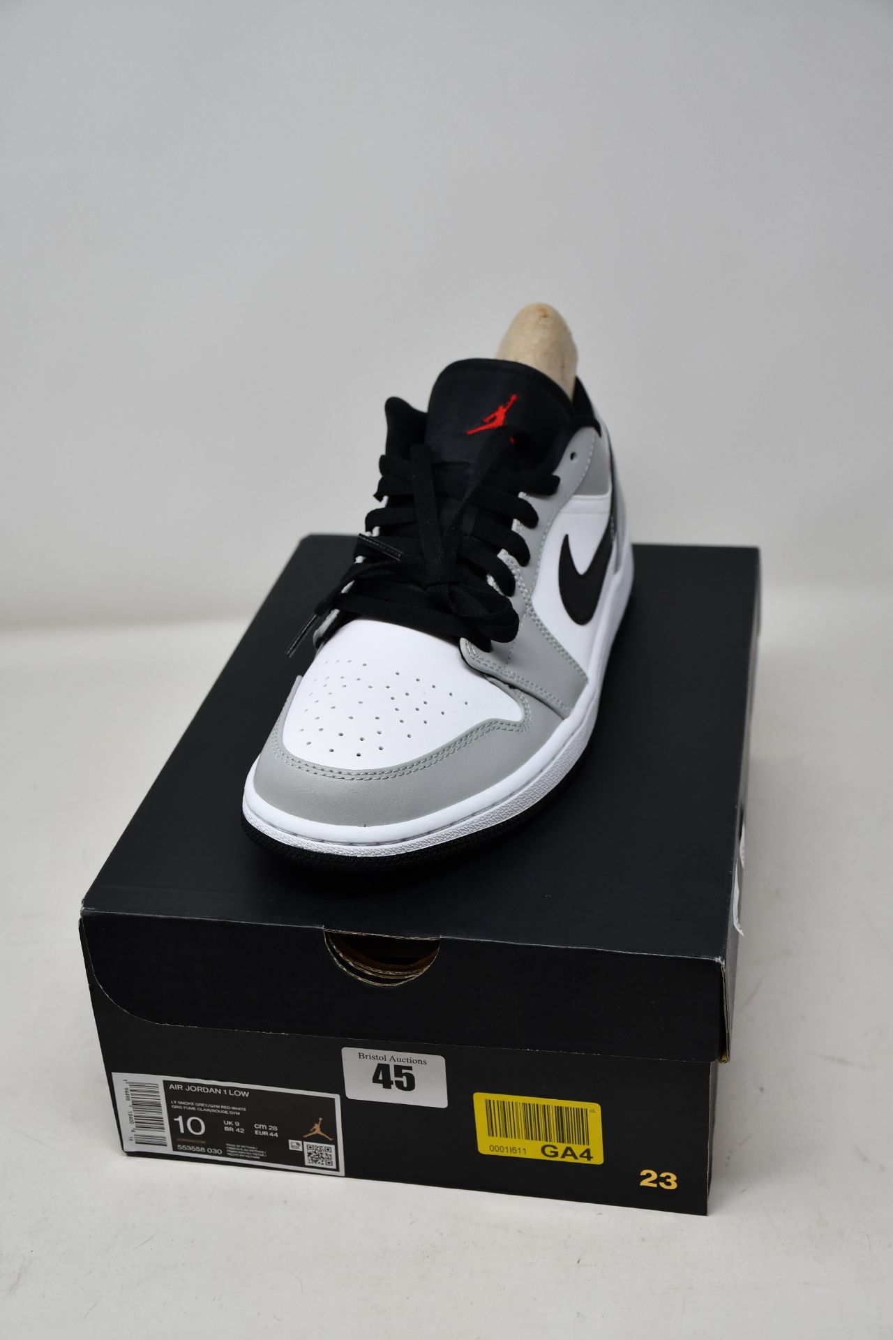 A pair of as new Nike Air Jordan 1 Low in smoke grey (UK 9).