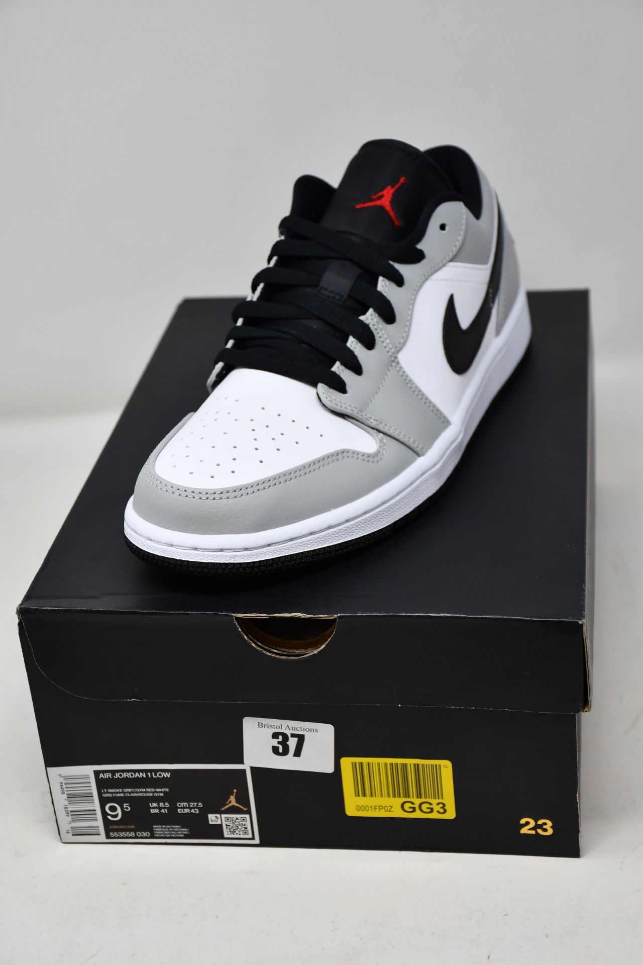 A pair of as new Nike Air Jordan 1 Low in smoke grey (UK 8.5).