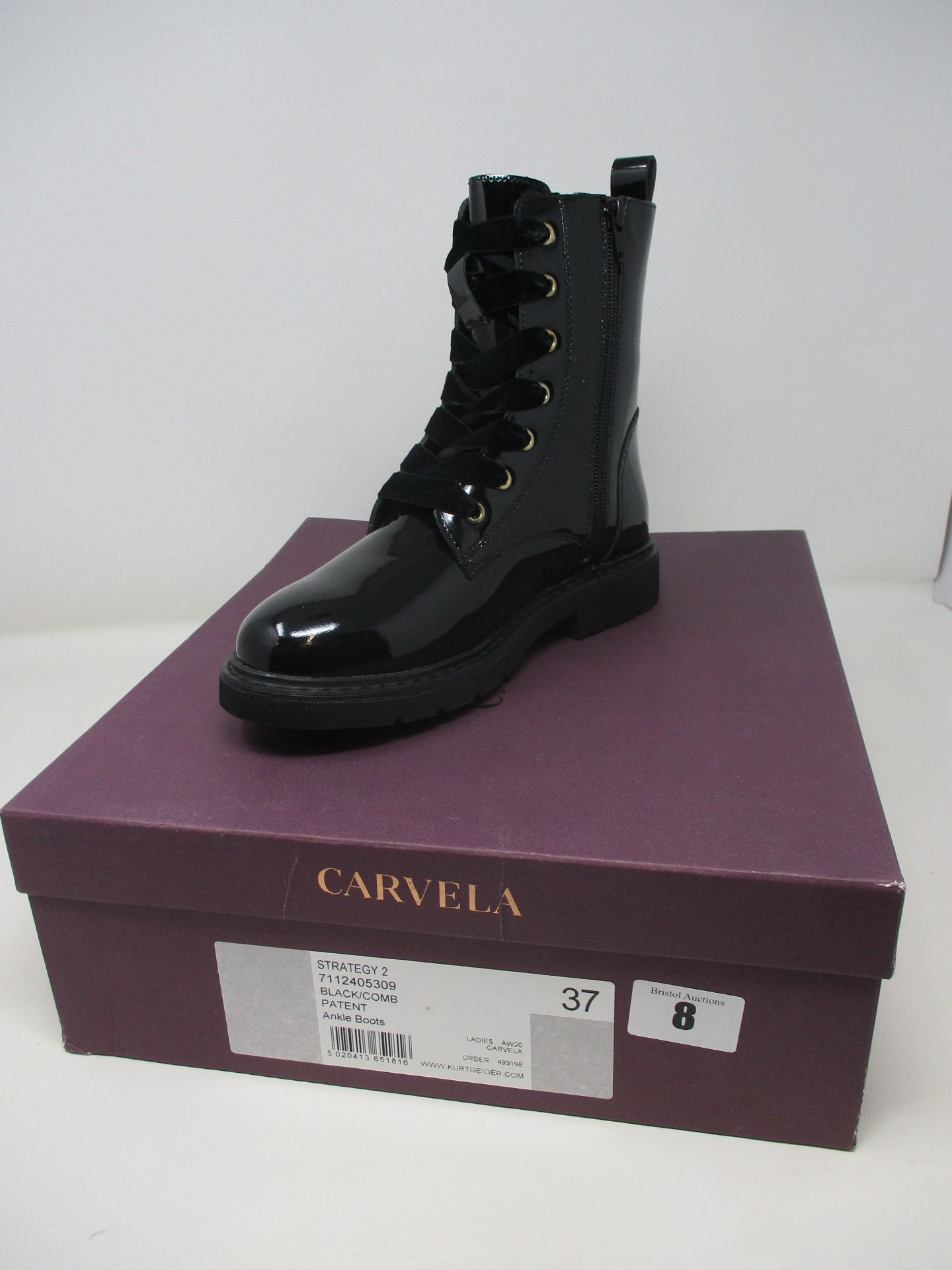 A pair of as new Carvela patent ankle boots (EU 37).