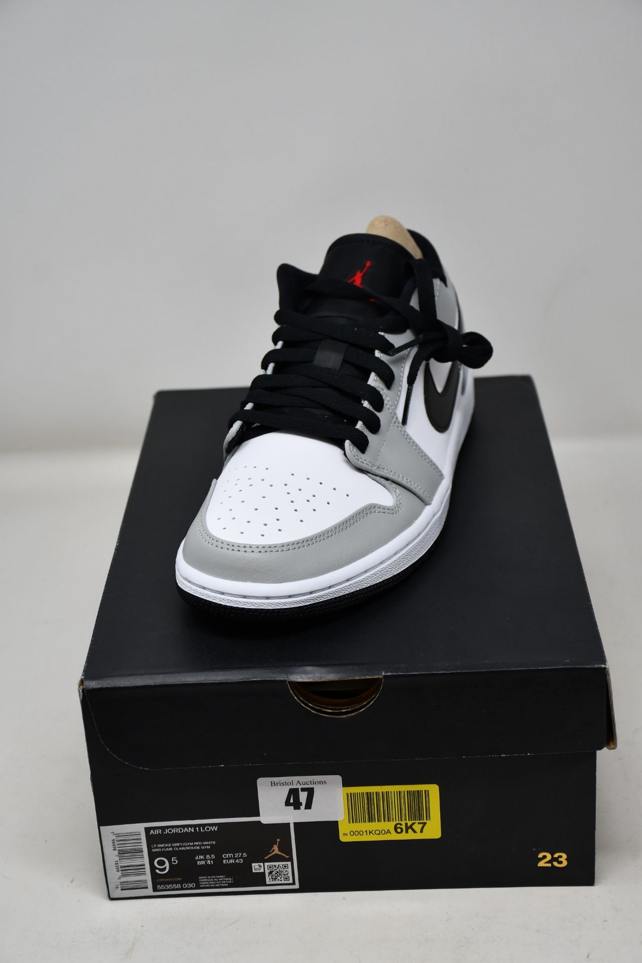 A pair of as new Nike Air Jordan 1 Low in smoke grey (UK 8.5).