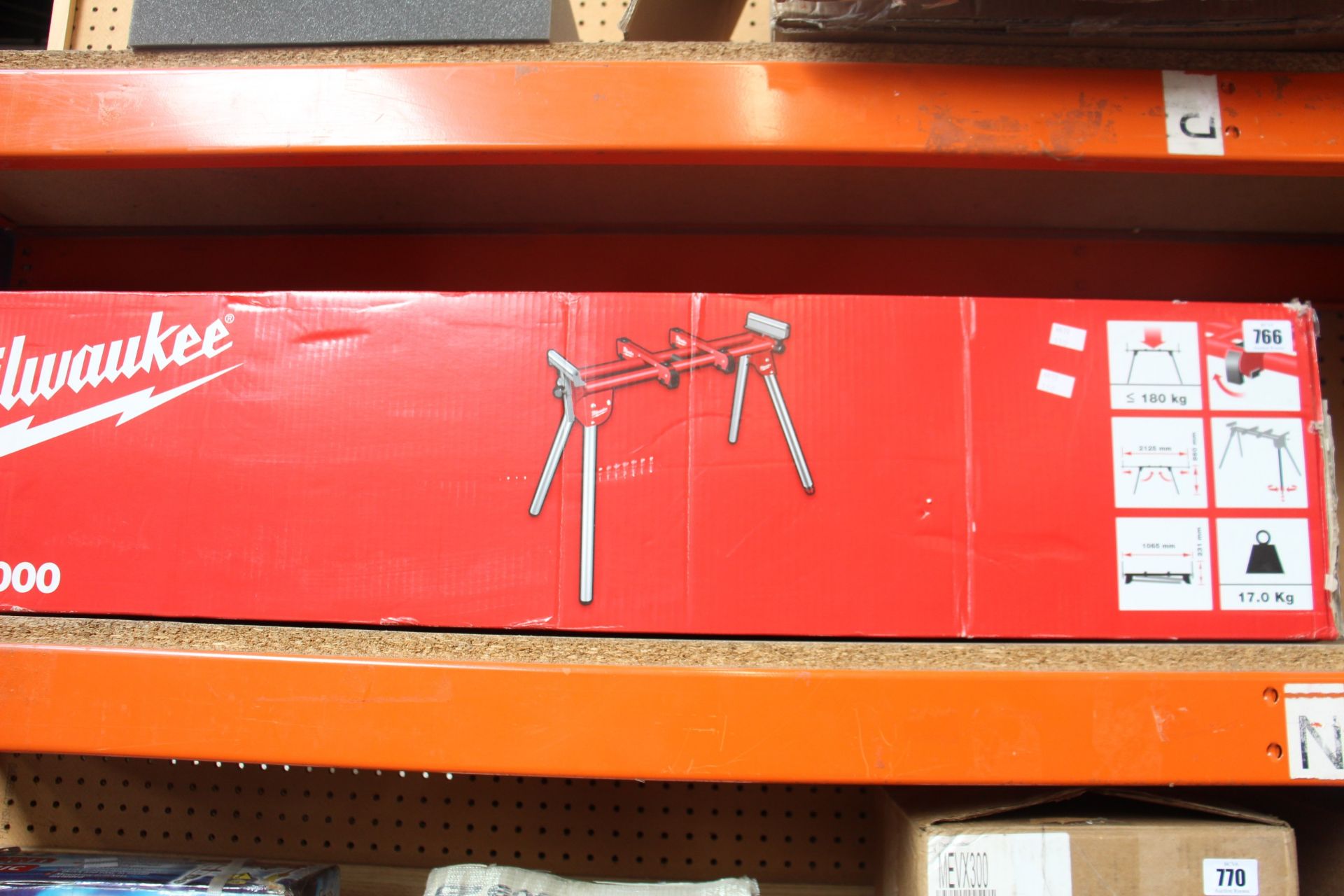 A boxed Milwaukee MSL 1000 Universal Mitre Saw Leg Stand.