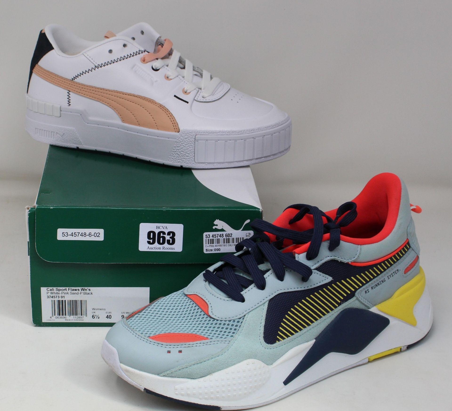 Two pairs of as new Puma trainers; RS-X Reinvention (UK 10) and women's Cali Sport Flaws (UK 6.5).