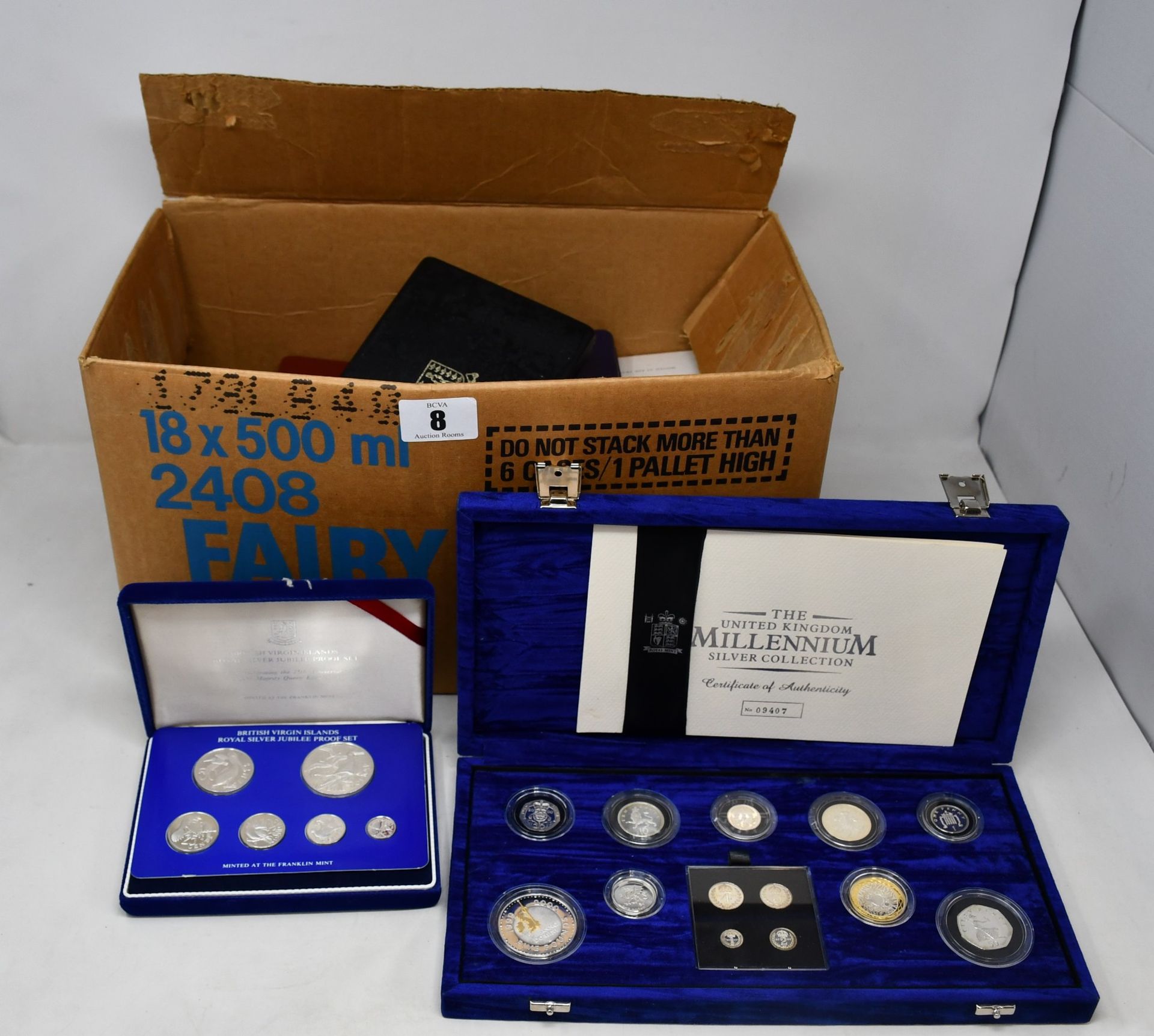 A box of coins to include large quantity of mostly sterling silver commemorative proof coins,