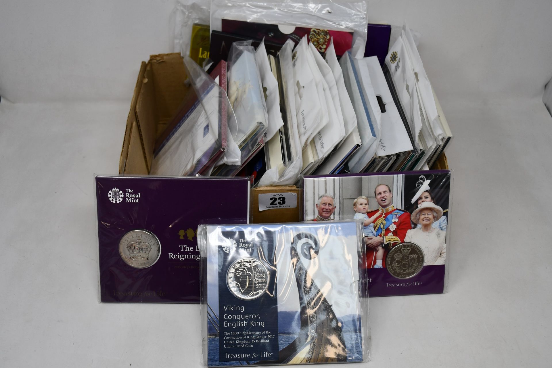 A box of £5 coins to include forty three uncirculated in Royal Mint special packs 1998 to date.