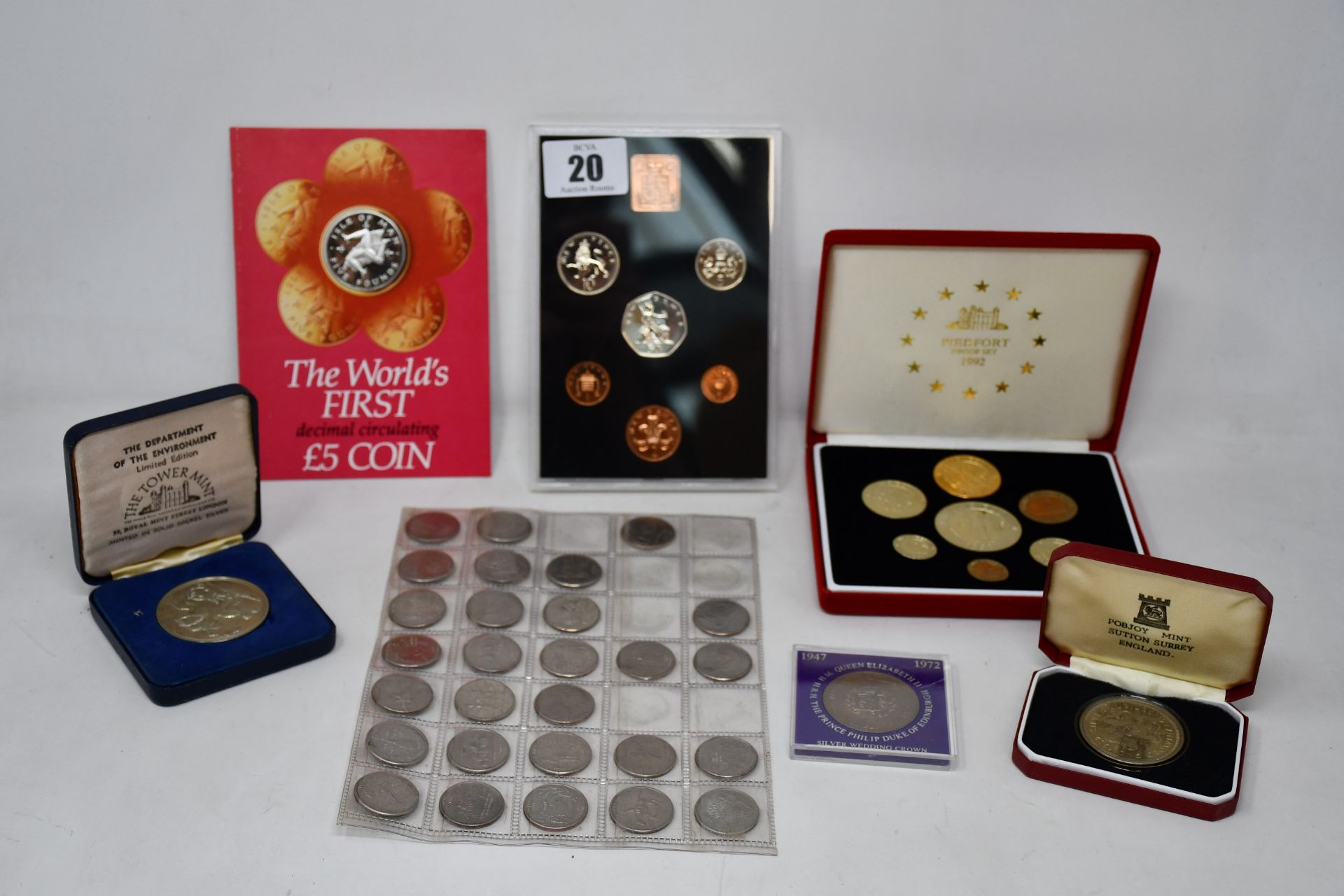 A box of coins to include large quantity of commemoration coins and year sets, some proof mostly
